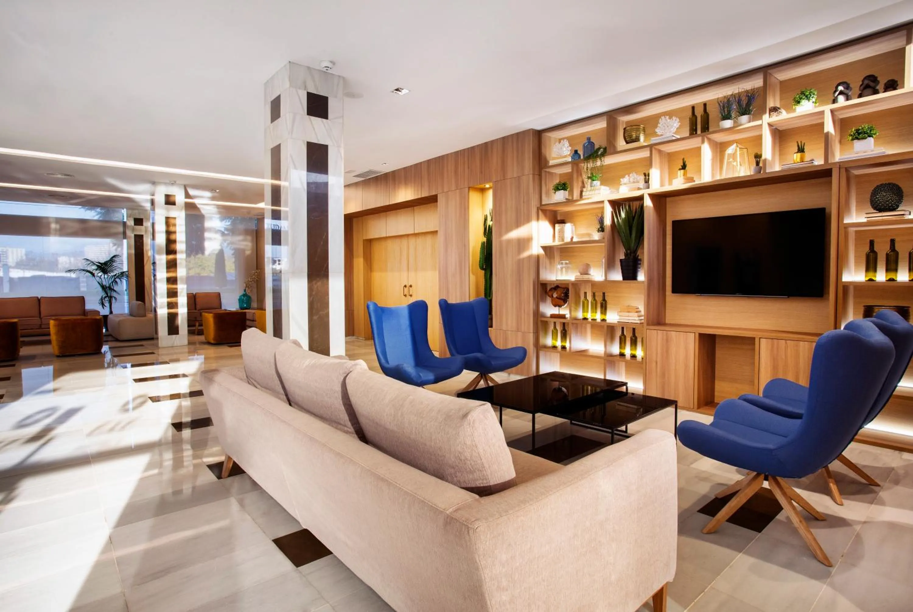 Communal lounge/ TV room in Exe Ciudad de Córdoba