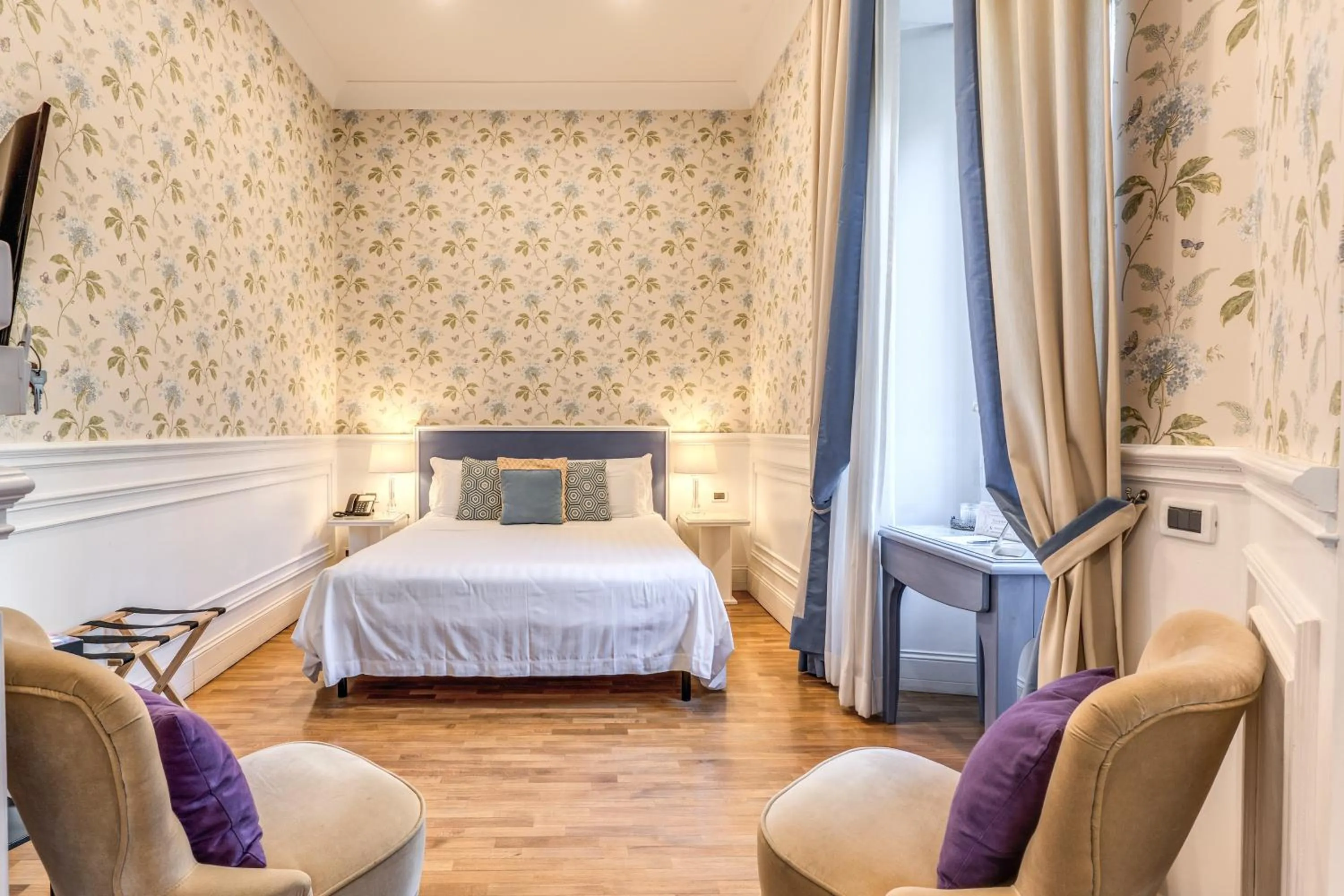 Bed in Mangili Garden Hotel