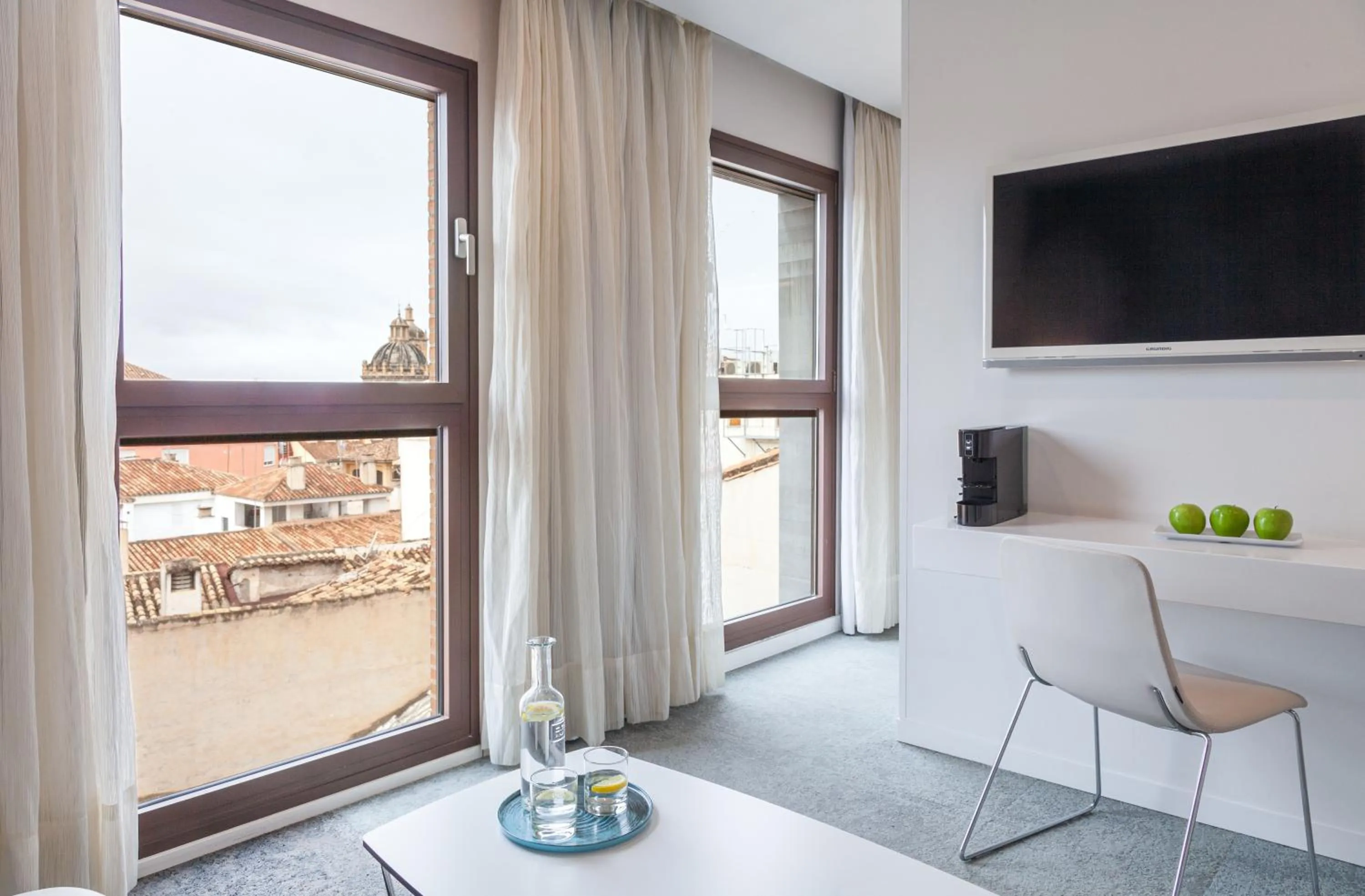 Photo of the whole room in Hotel Maciá Granada Five Senses Rooms & Suites