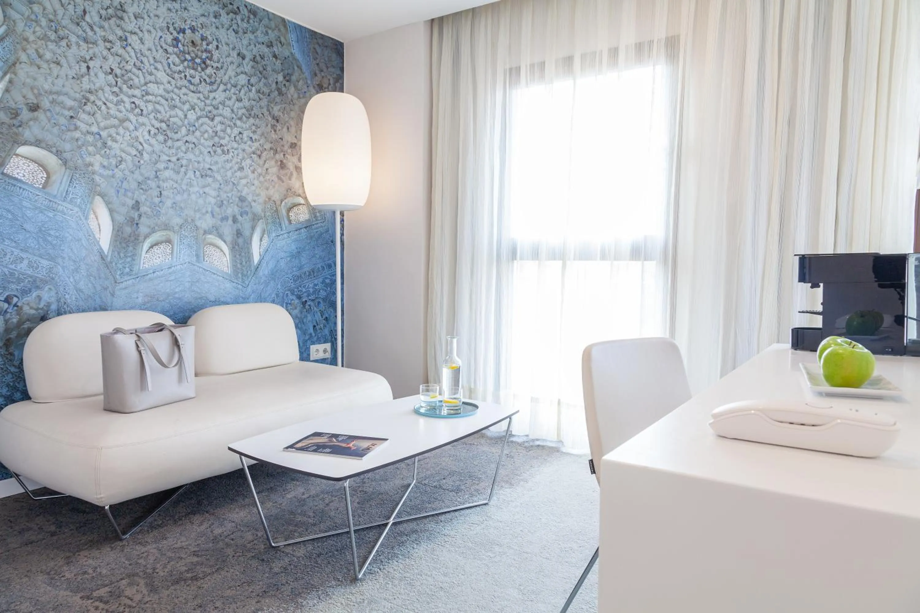 Seating area in Hotel Maciá Granada Five Senses Rooms & Suites