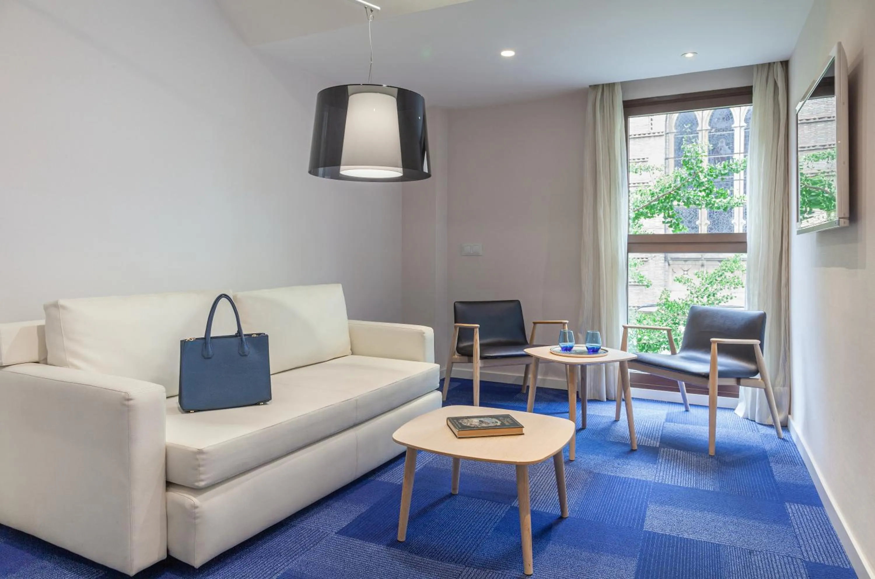 Seating area in Hotel Maciá Granada Five Senses Rooms & Suites