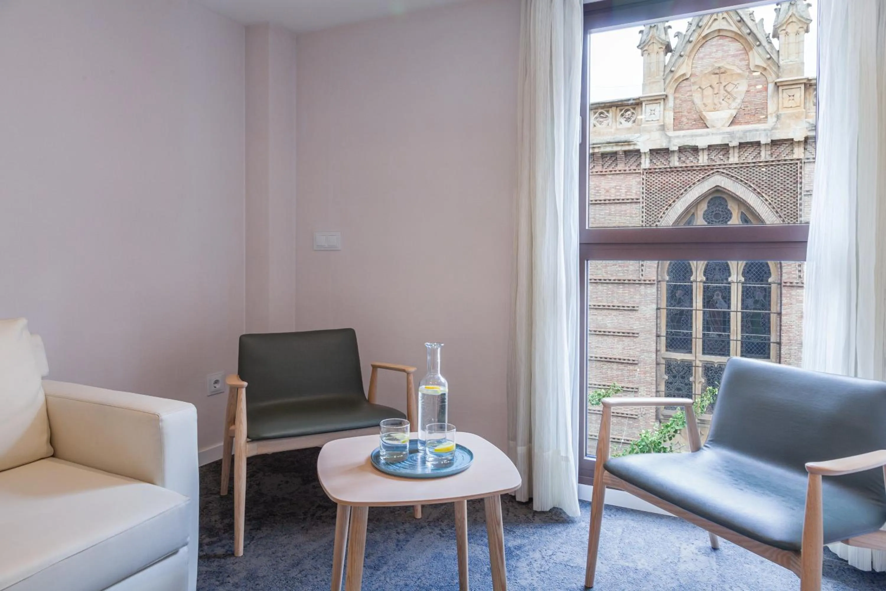 Seating area in Hotel Maciá Granada Five Senses Rooms & Suites