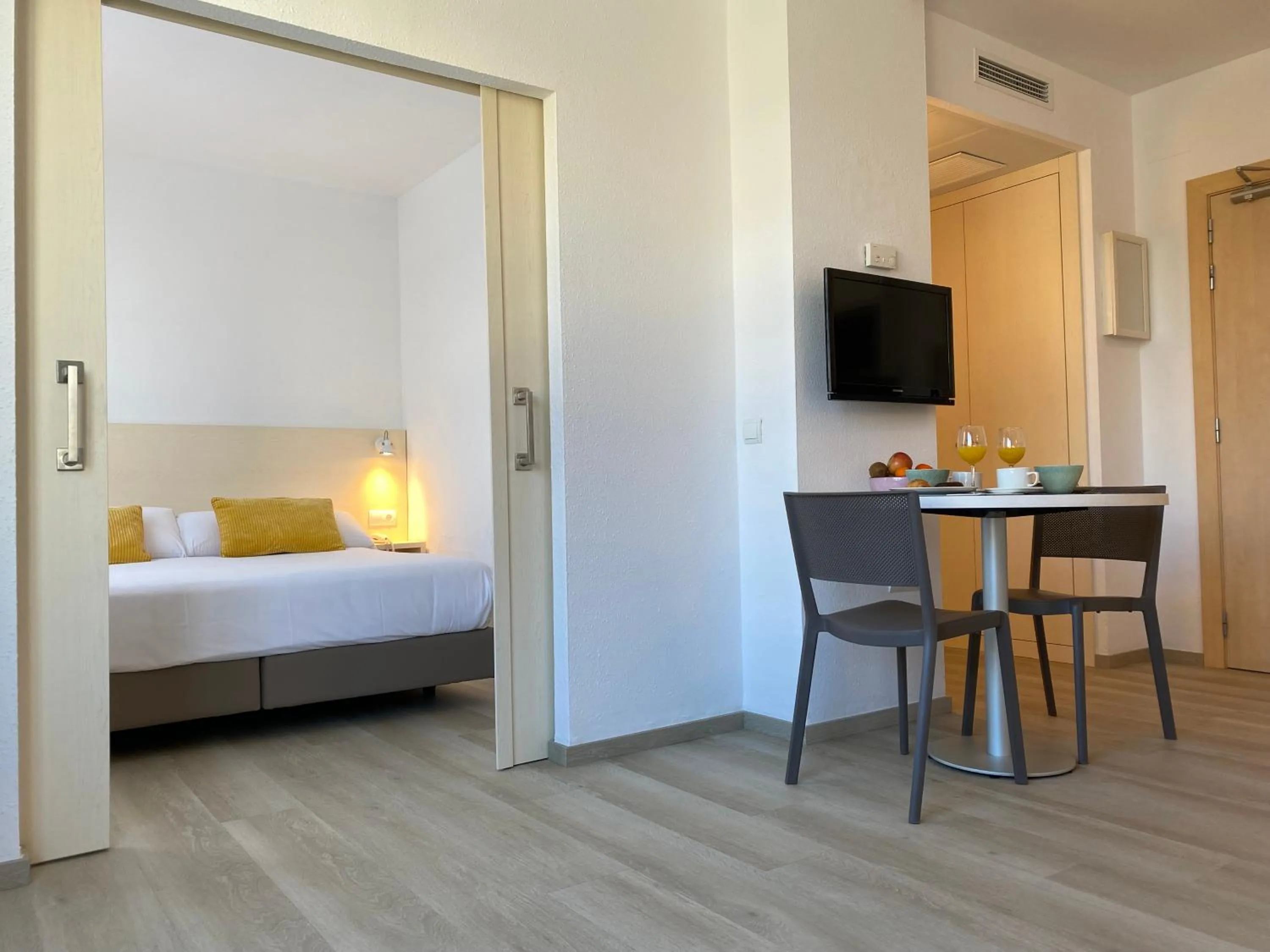 Bed in Atenea Park Suites & Apartments