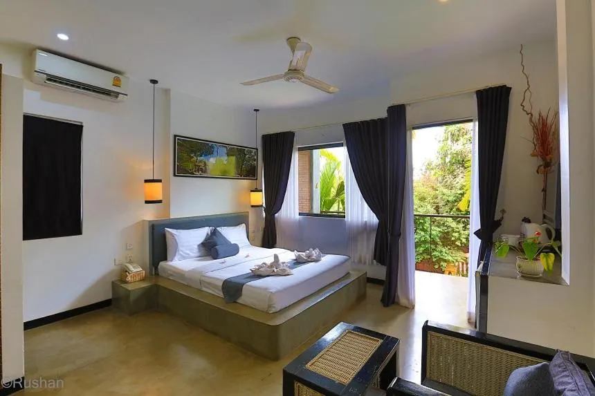 Bed in Apsara Greenland Boutique Villa & Resort