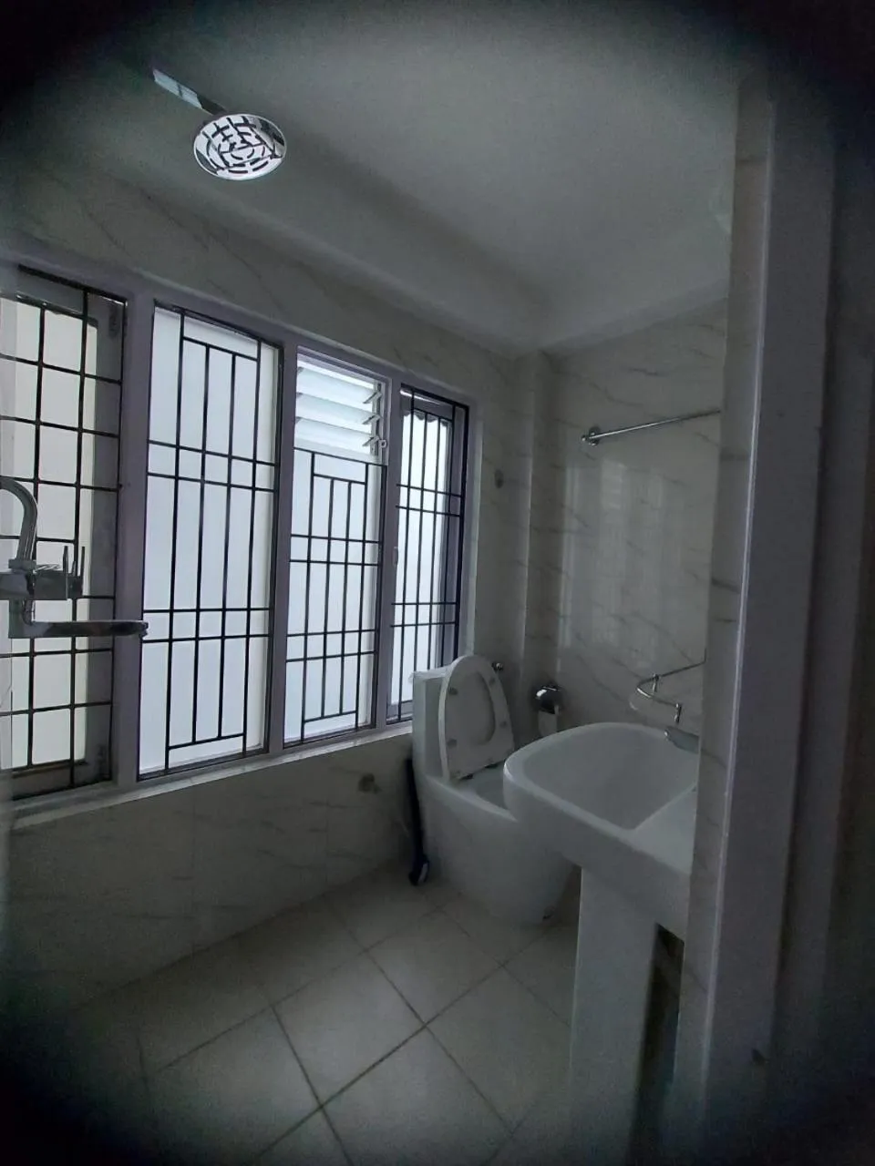 Toilet in Om Bramha Hotel