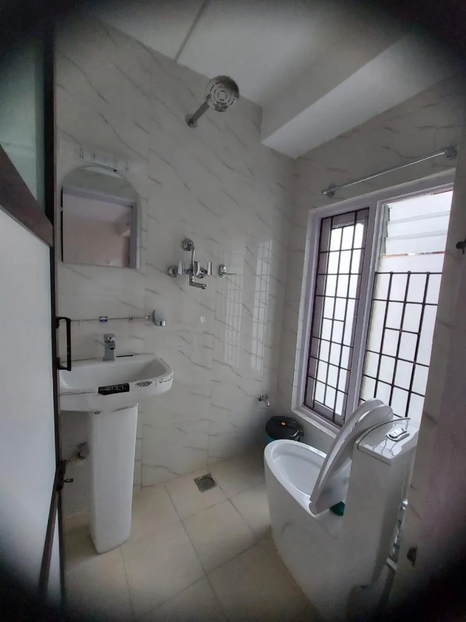 Toilet in Om Bramha Hotel