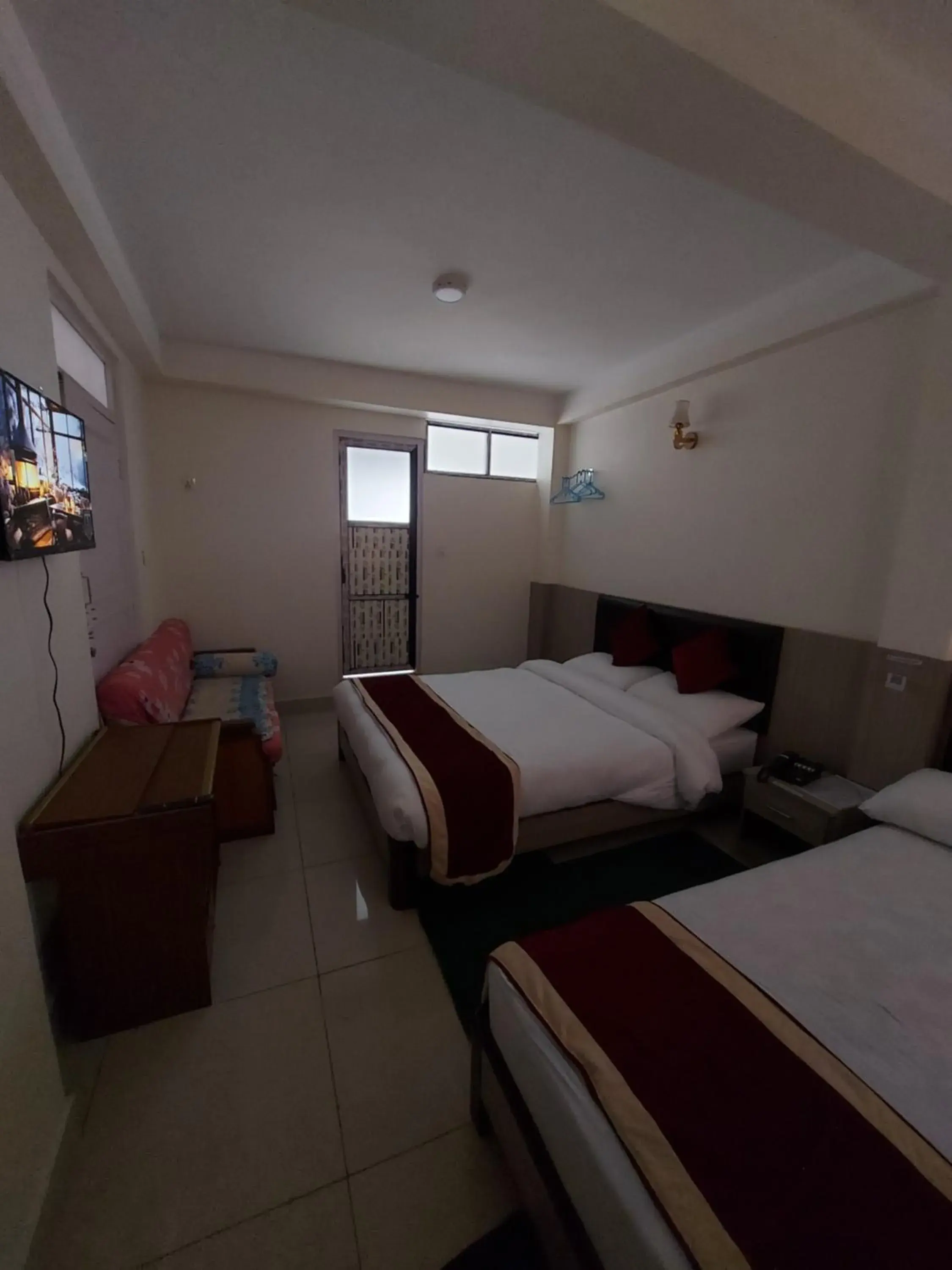 Triple Room in Om Bramha Hotel Triple Room in Om Bramha Hotel