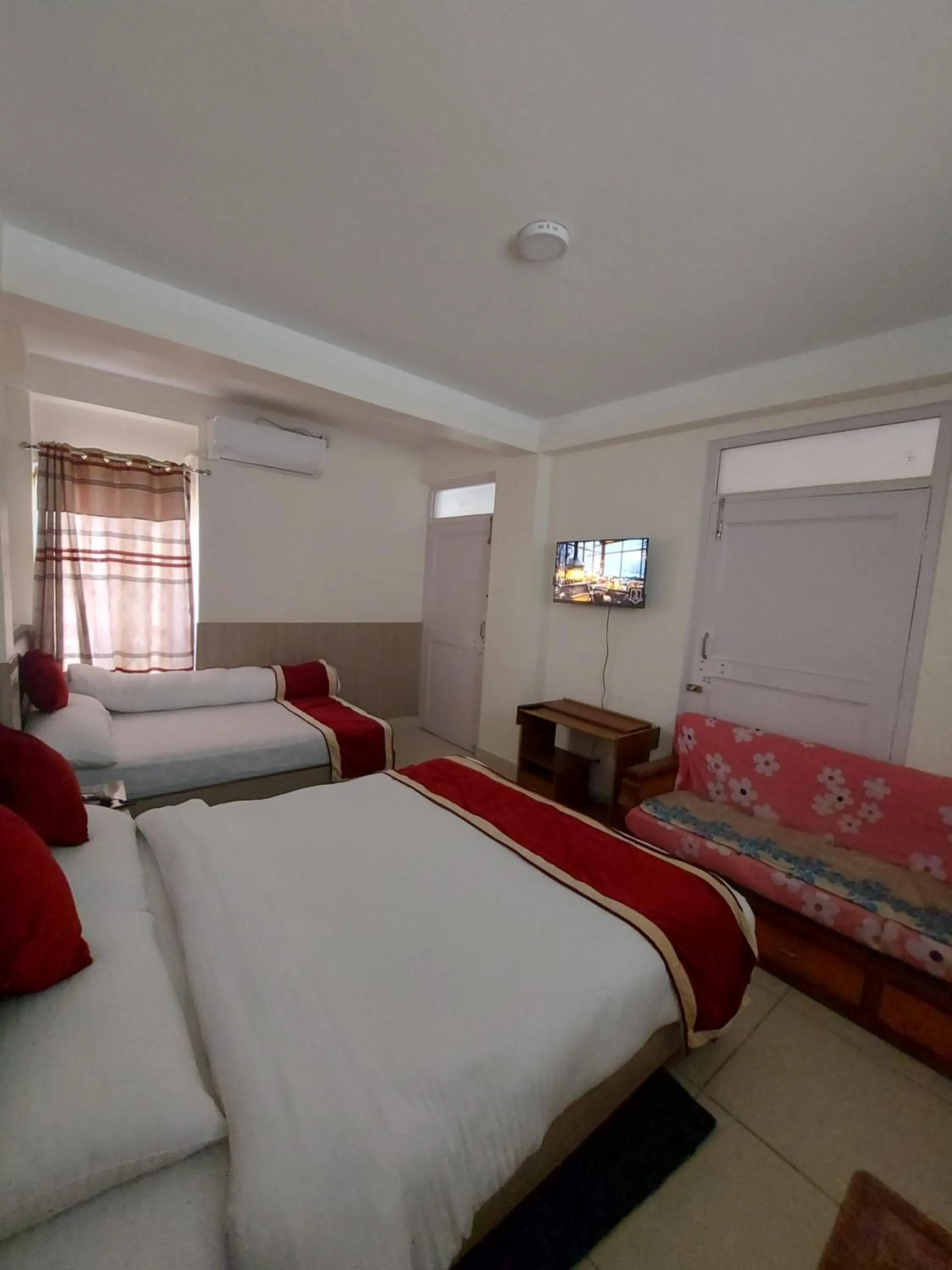 Bed in Om Bramha Hotel