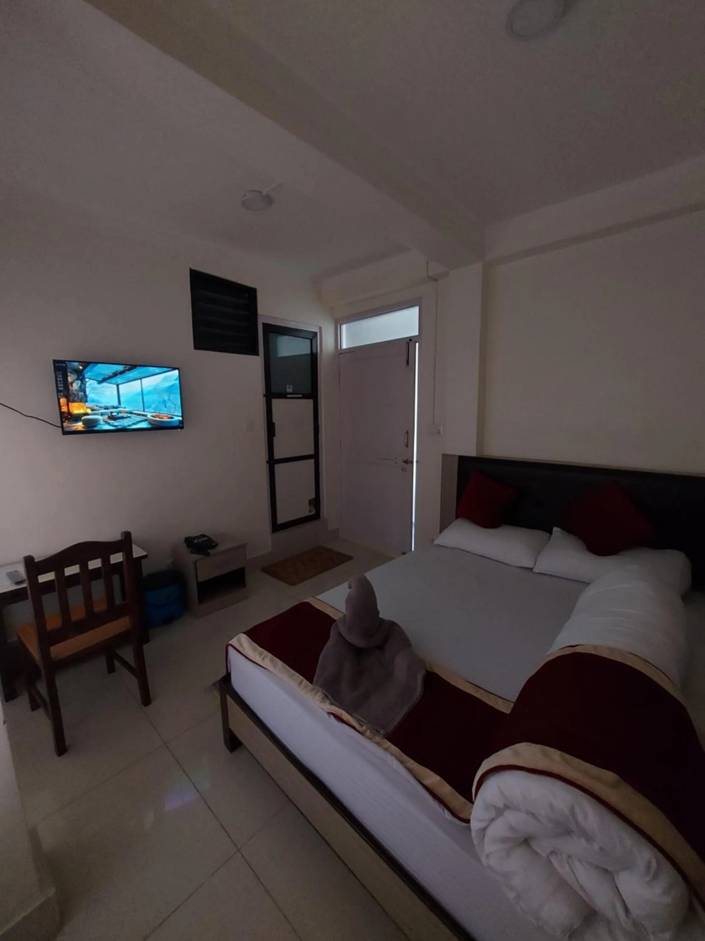 Bed in Om Bramha Hotel