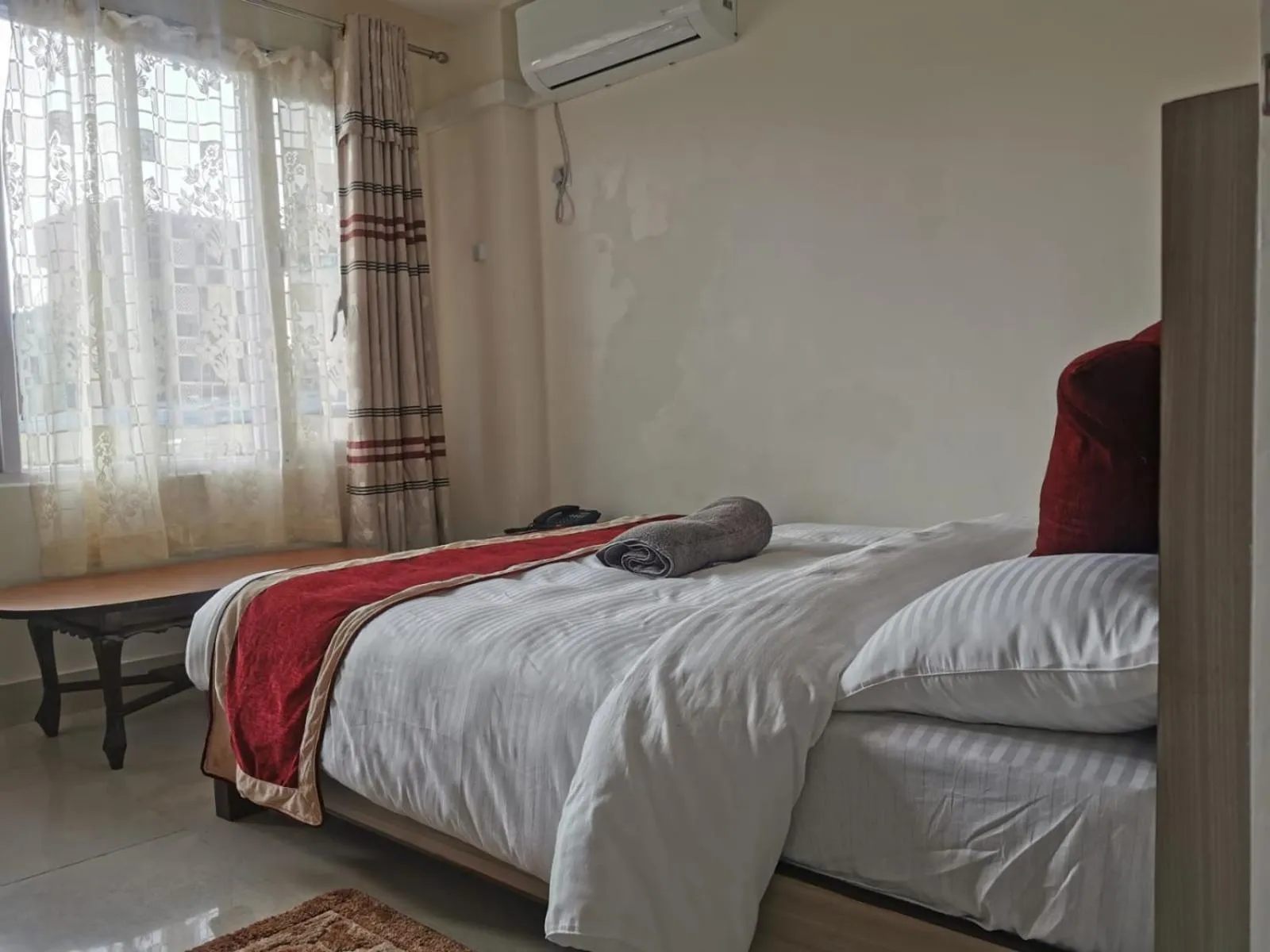 Bed in Om Bramha Hotel