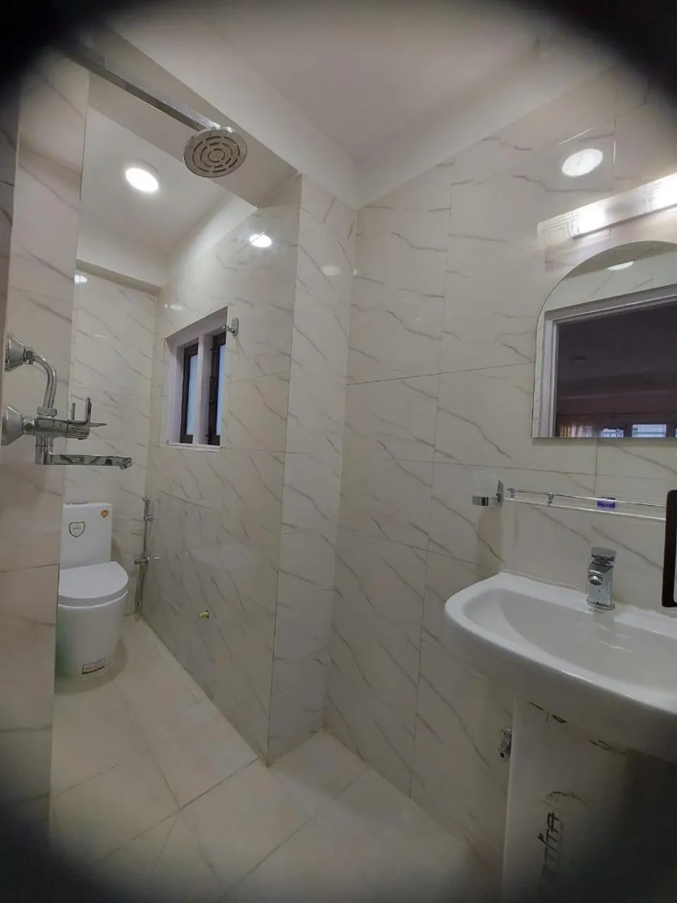 Toilet in Om Bramha Hotel