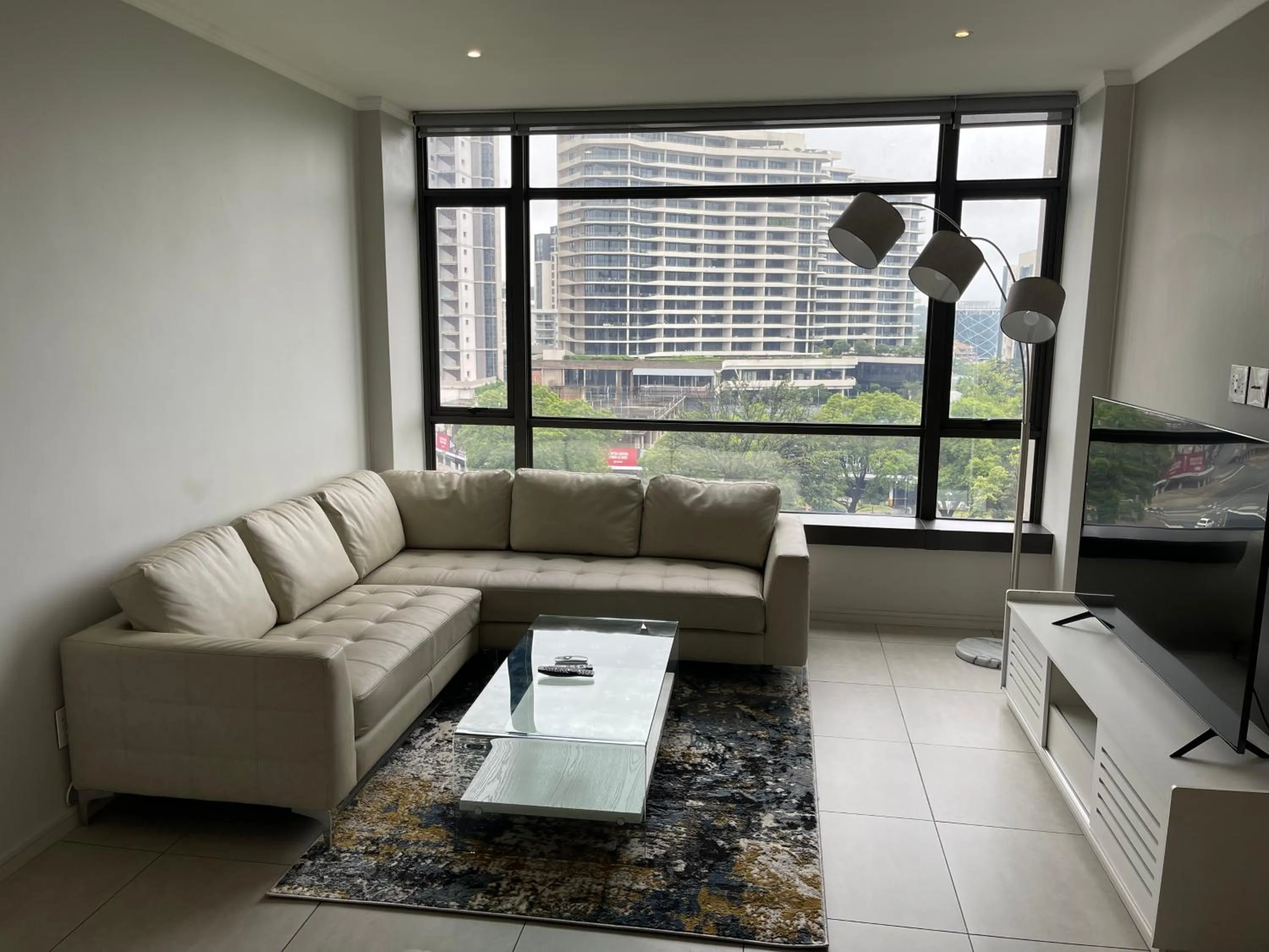 Communal lounge/ TV room in CGRSA Apartments Sandton