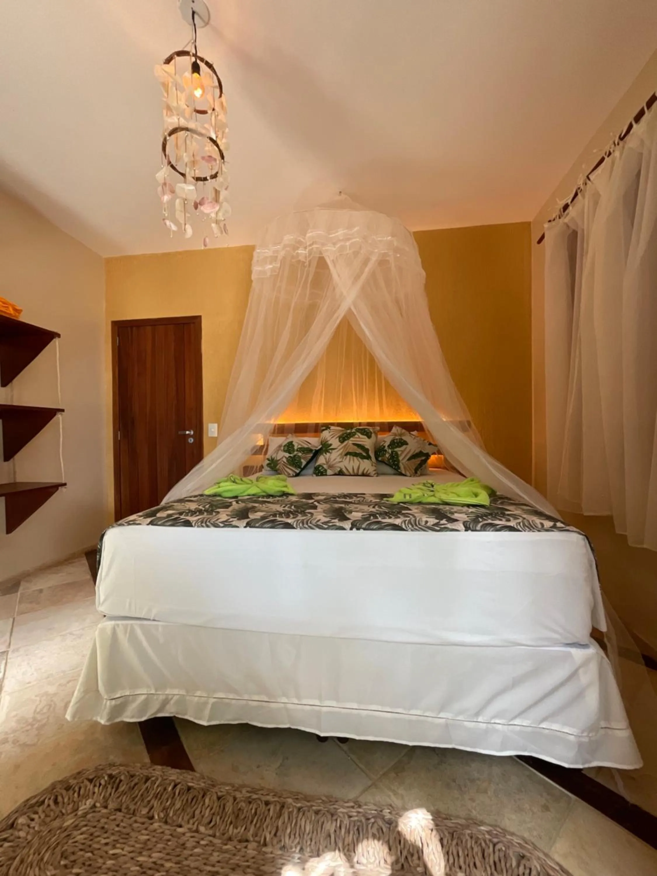Bed in Camozen Resort & Spa