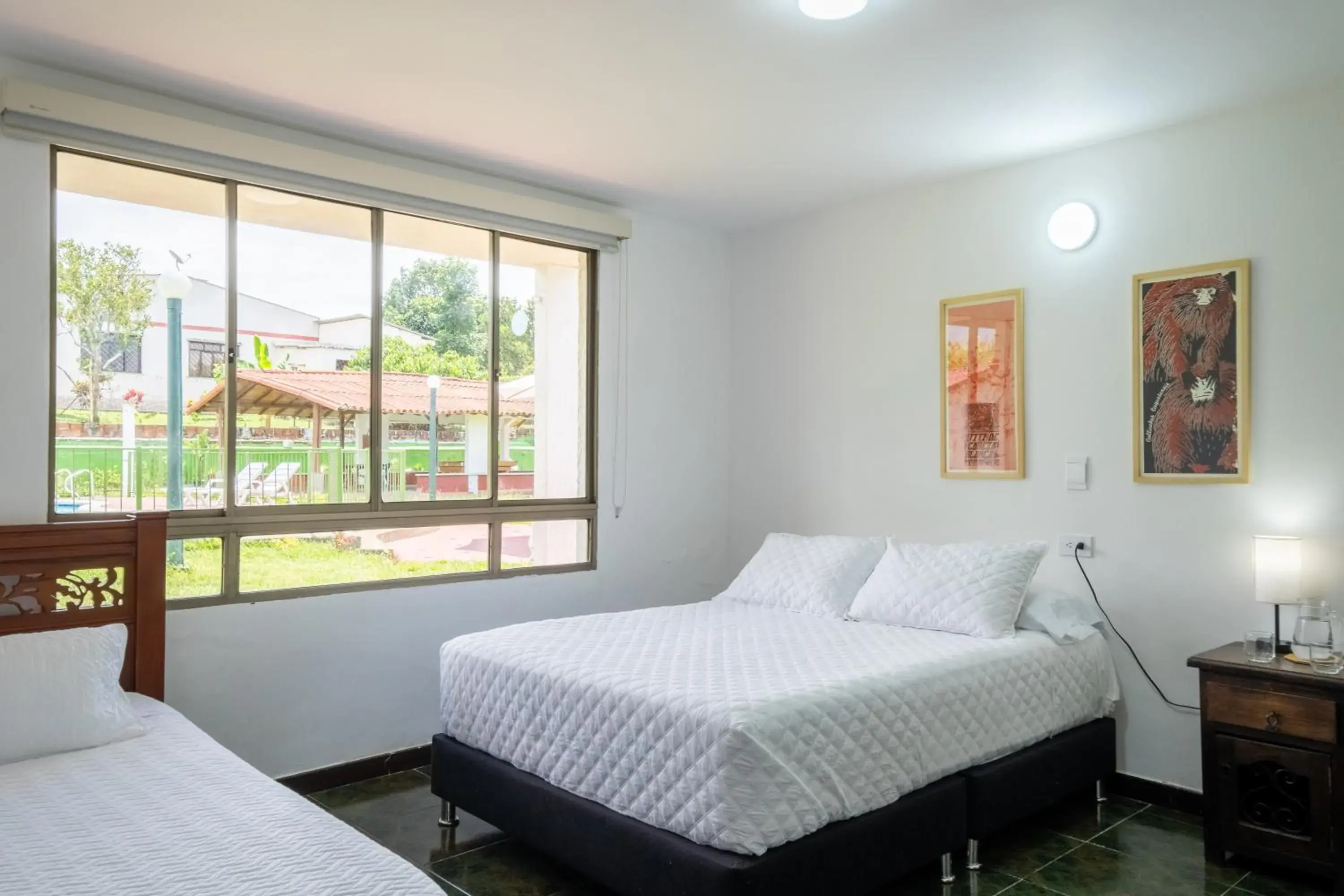 Triple Room with Pool View in Hotel Chalet La Sofia by Majuva Triple Room with Pool View in Hotel Chalet La Sofia by Majuva