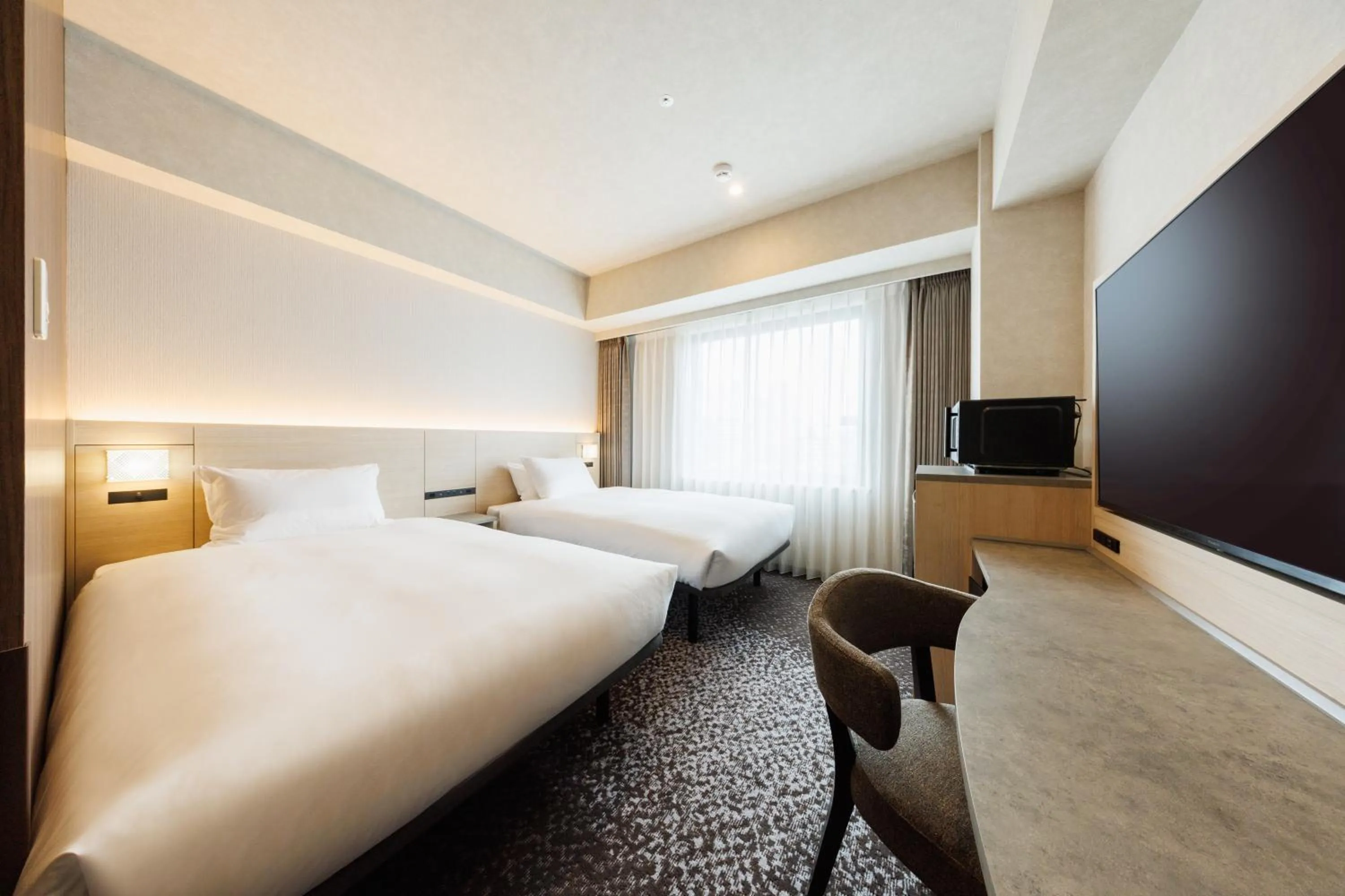 Photo of the whole room, Bed in JR-East Hotel Mets Shibuya