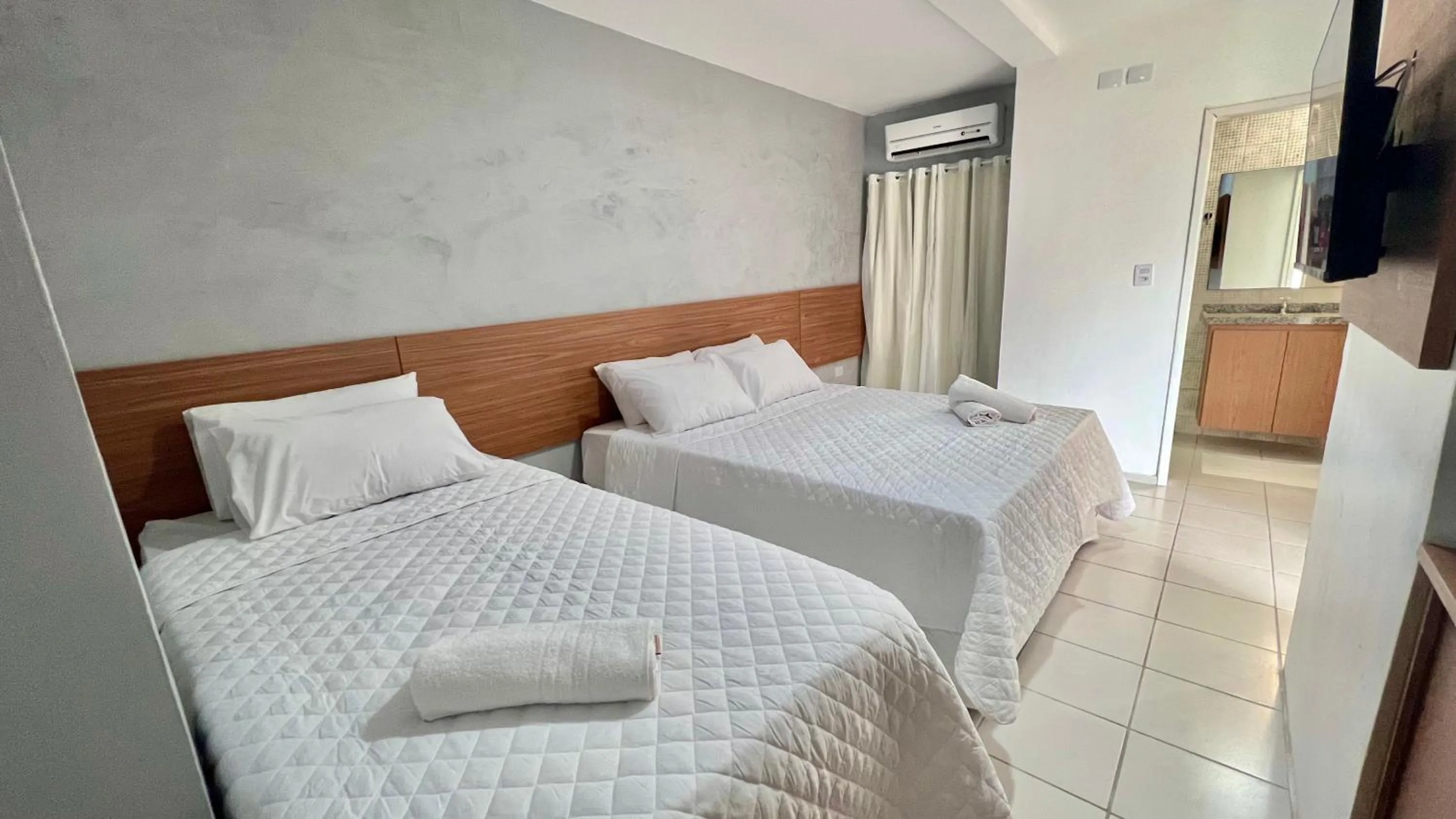 Bed in Pousada Mali em frente as Piscinas Naturais