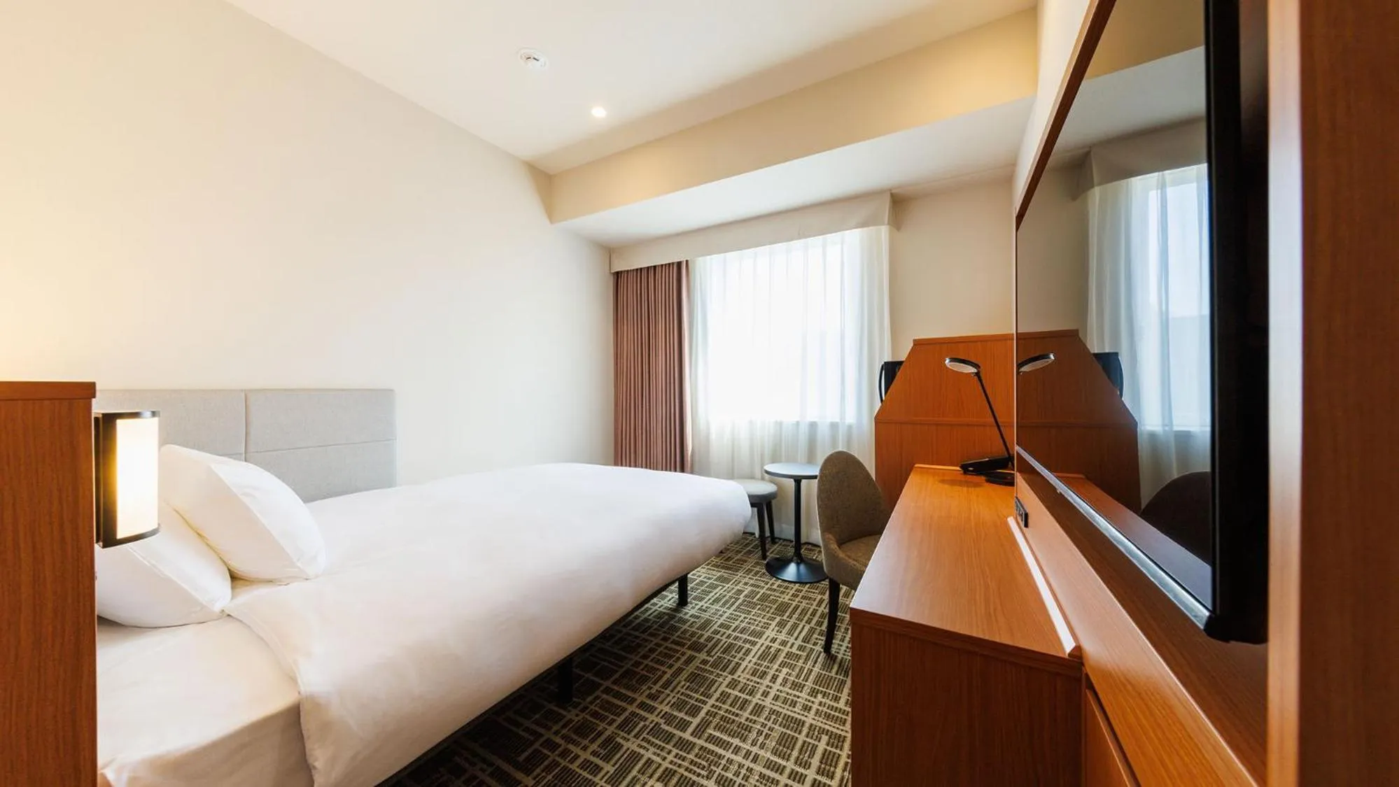 Photo of the whole room, Bed in JR-East Hotel Mets Komagome