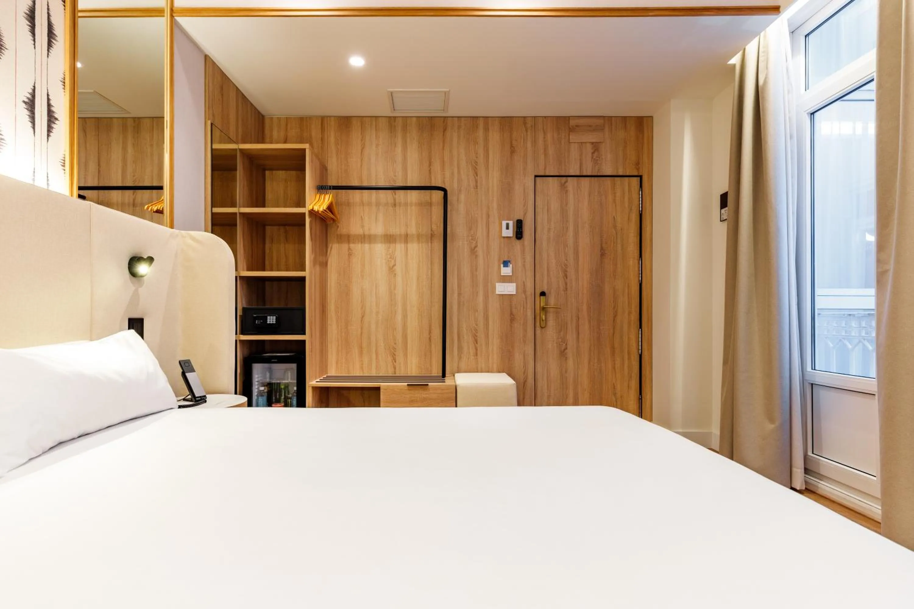 Bed in Petit Palace Plaza de la Reina