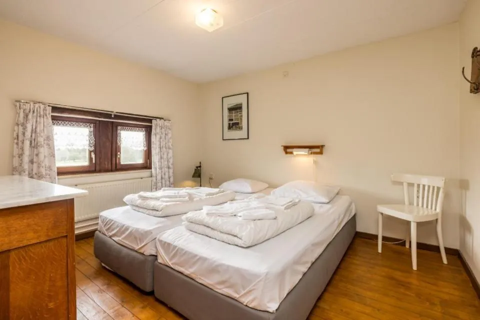 Bed in Hotel,Herberg & Appartementen de Smidse