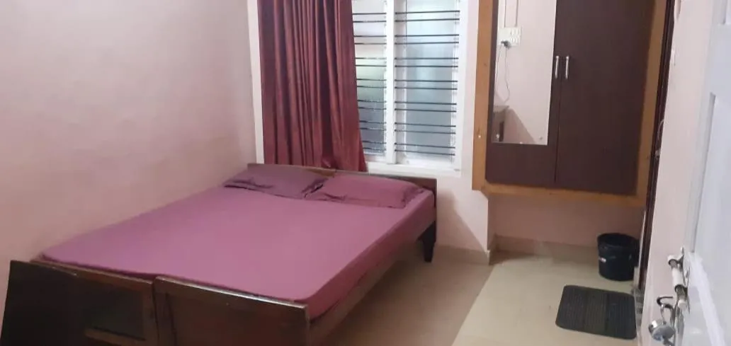 Bed in JEENA MOTEL
