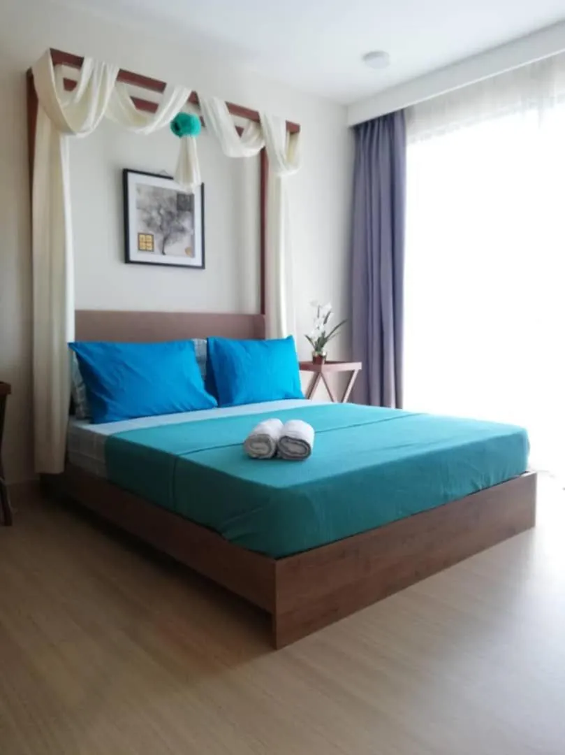 Bed in Timur Bay by Dream View Studio