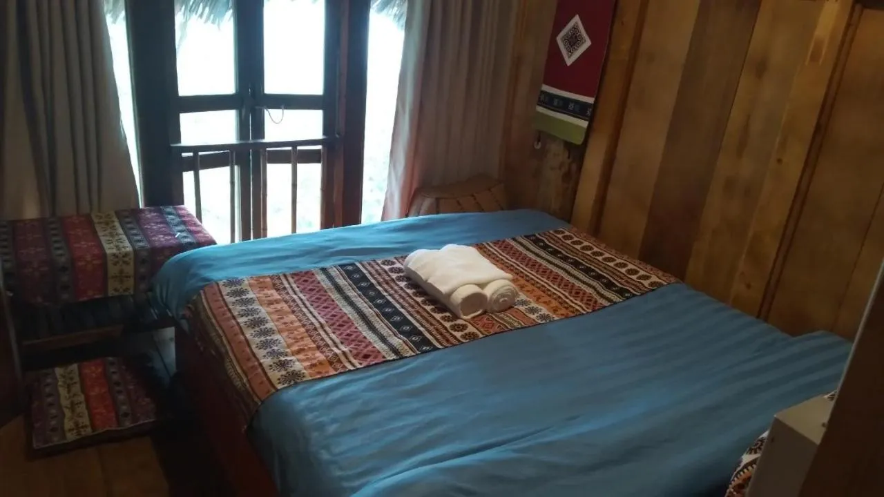 Bed in Ta Xua Ecolodge
