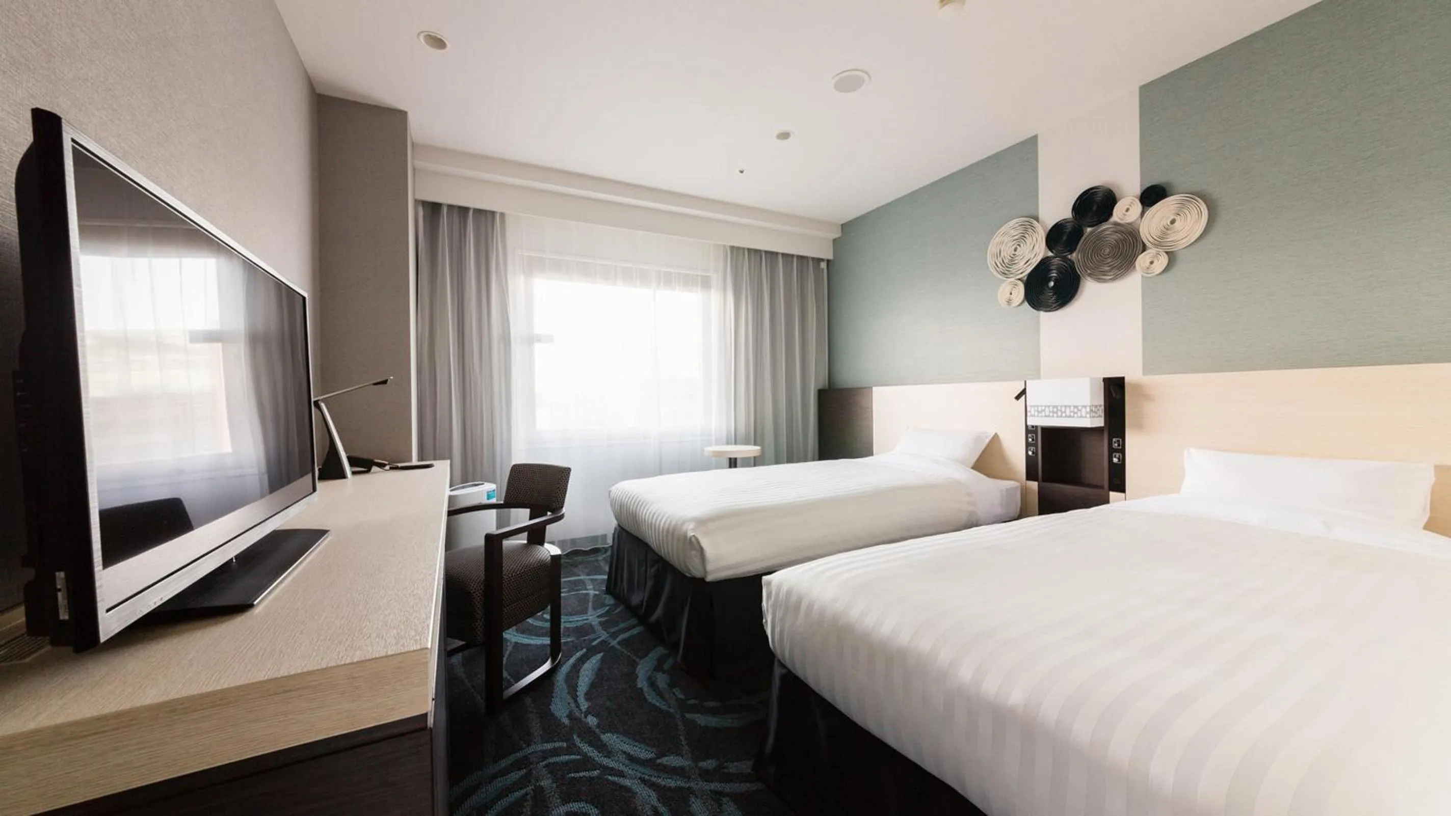 Bed in JR-East Hotel Mets Mizonokuchi