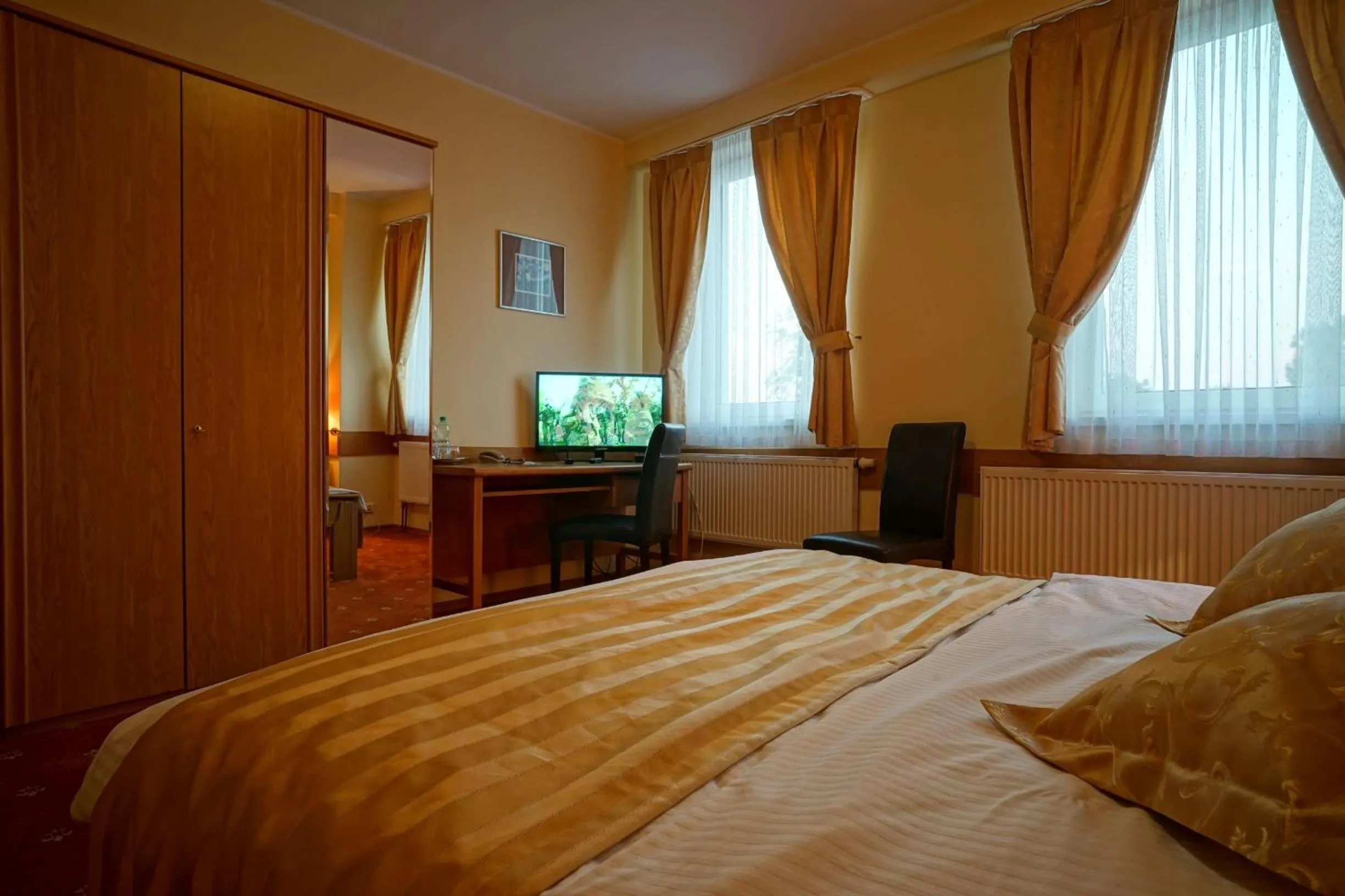 Communal lounge/ TV room in Noclegi w Lublińcu Lubex