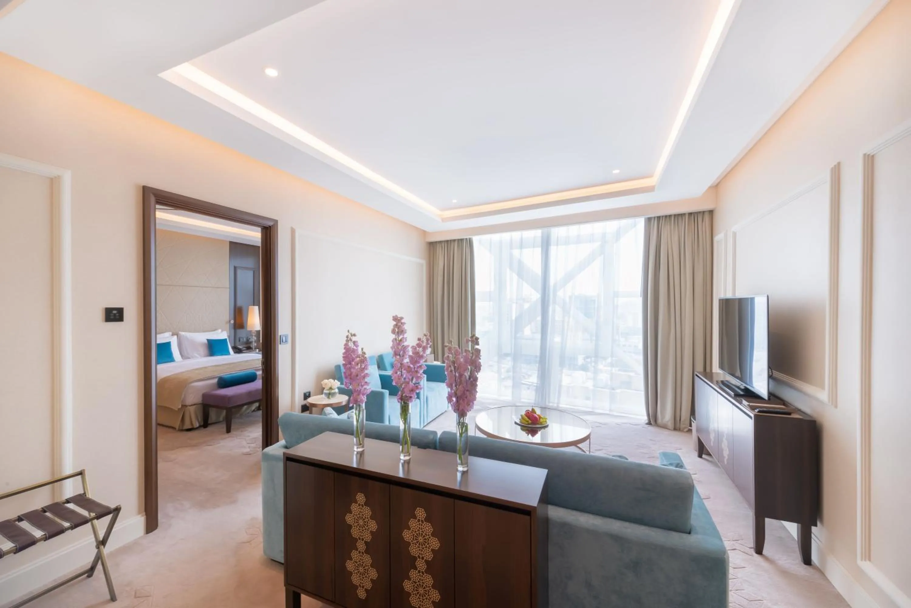 Communal lounge/ TV room, Bed in Shaza Doha