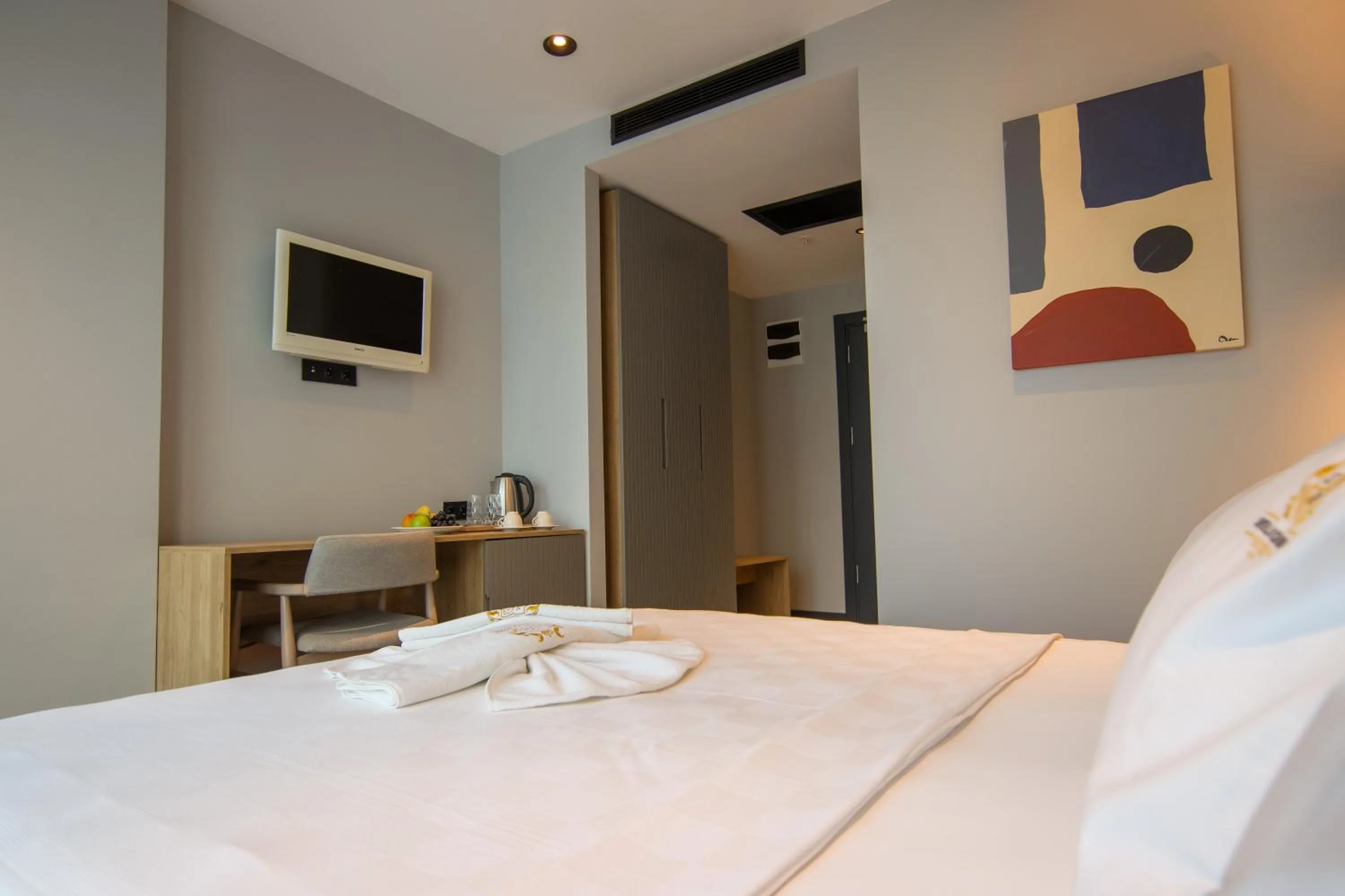 Bed in SHERLOCK HOMES HOTELS