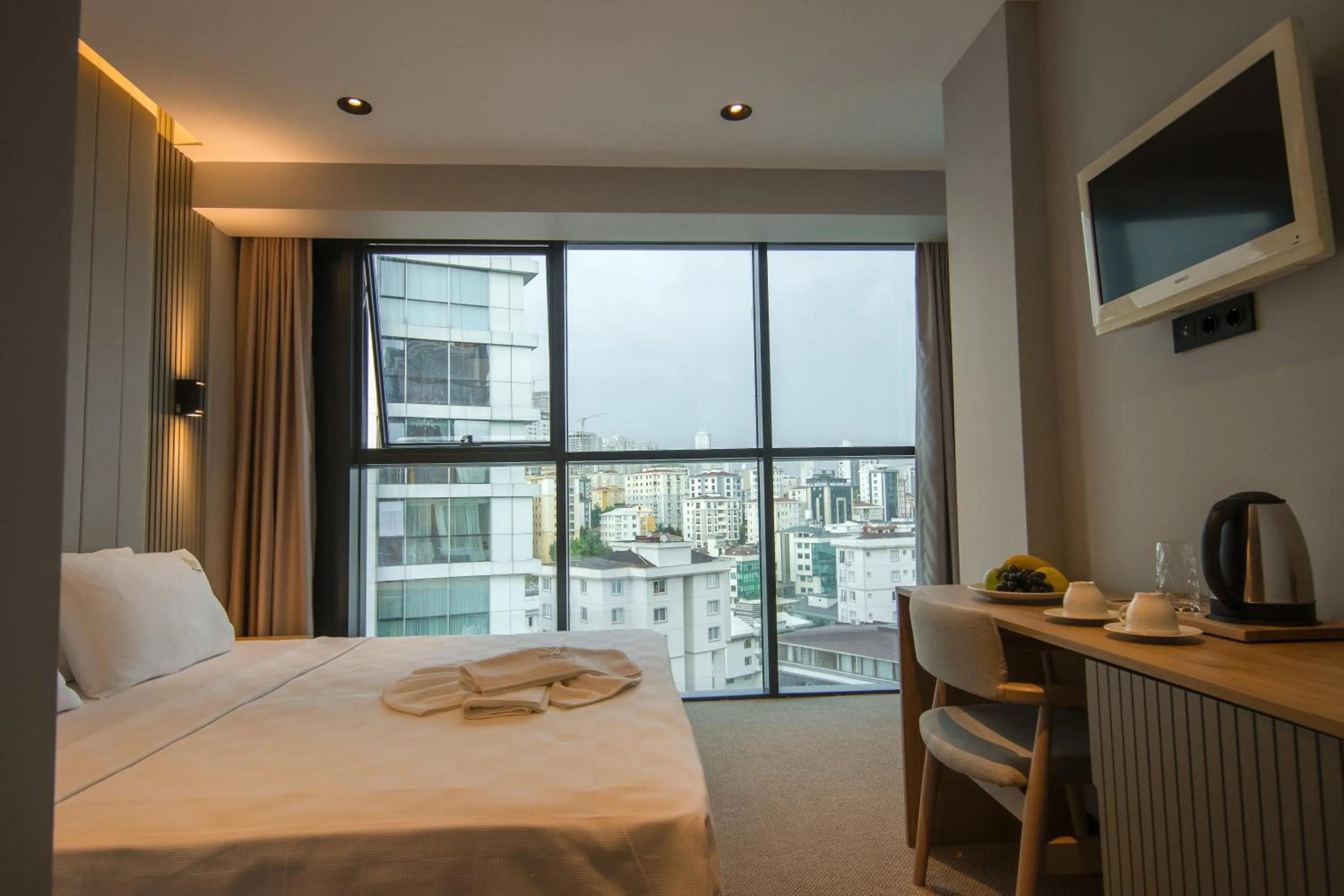 Bed in SHERLOCK HOMES HOTELS