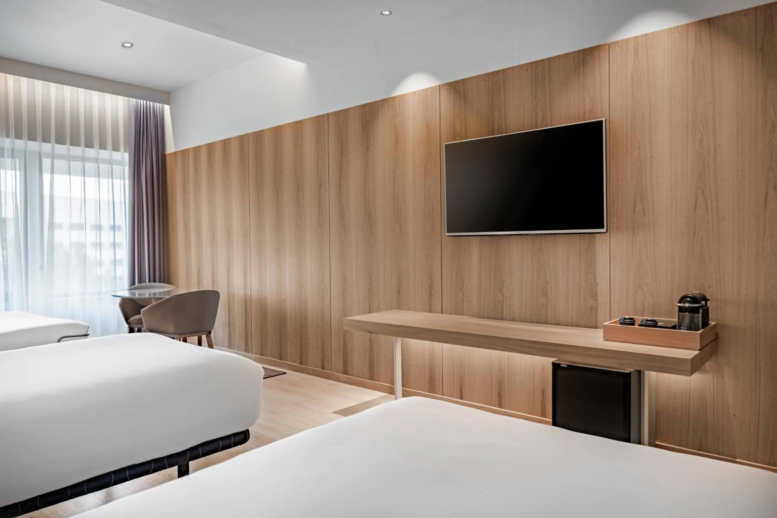 Photo of the whole room, Bed in AC Hotel Diagonal L'Illa by Marriott