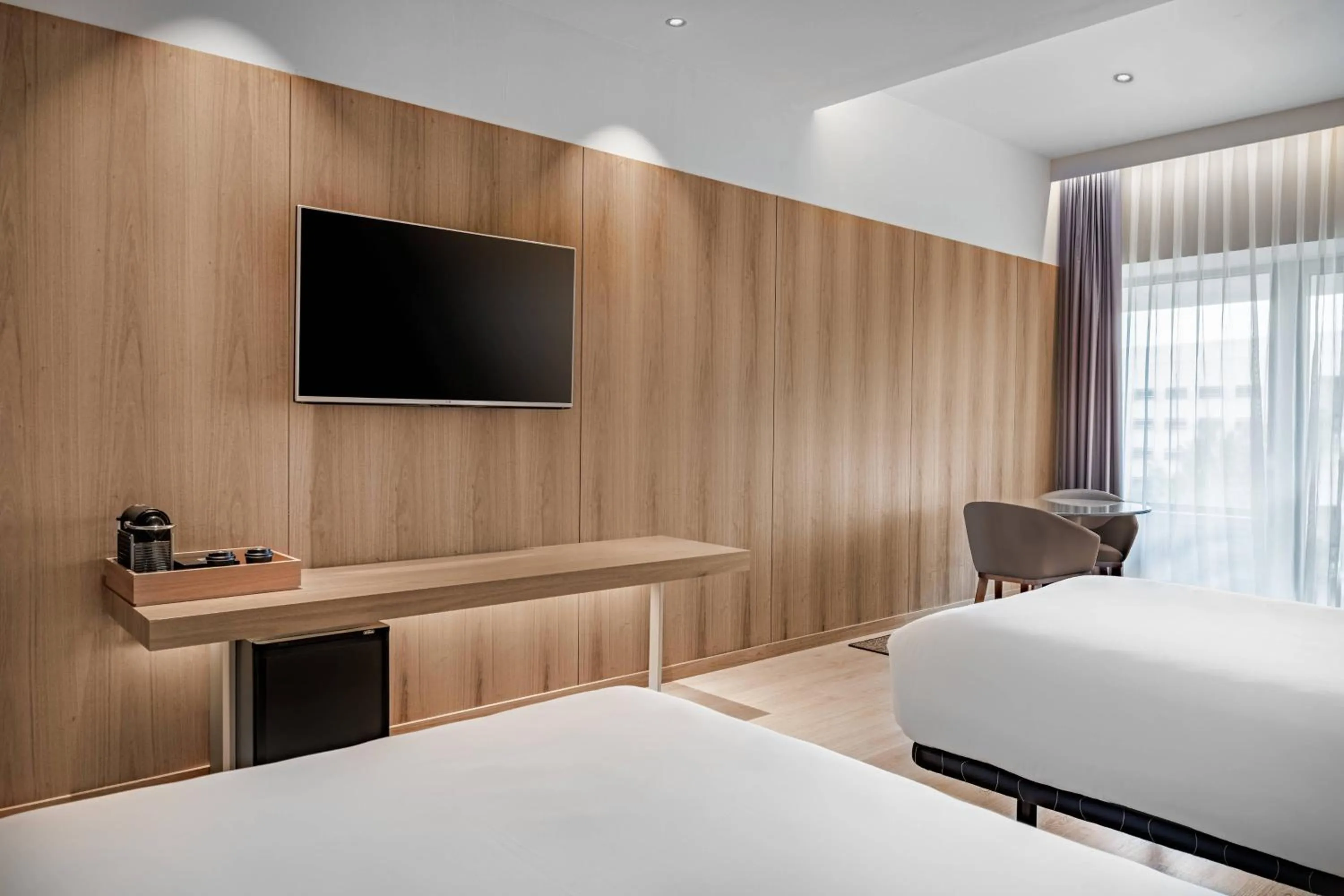 Photo of the whole room, Bed in AC Hotel Diagonal L'Illa by Marriott