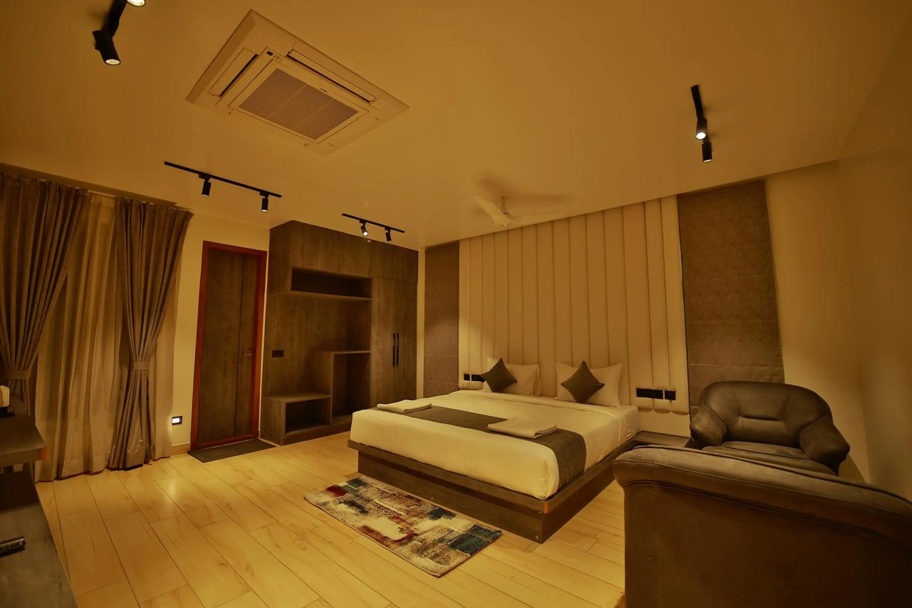 Photo of the whole room, Bed in The Mysore Grand