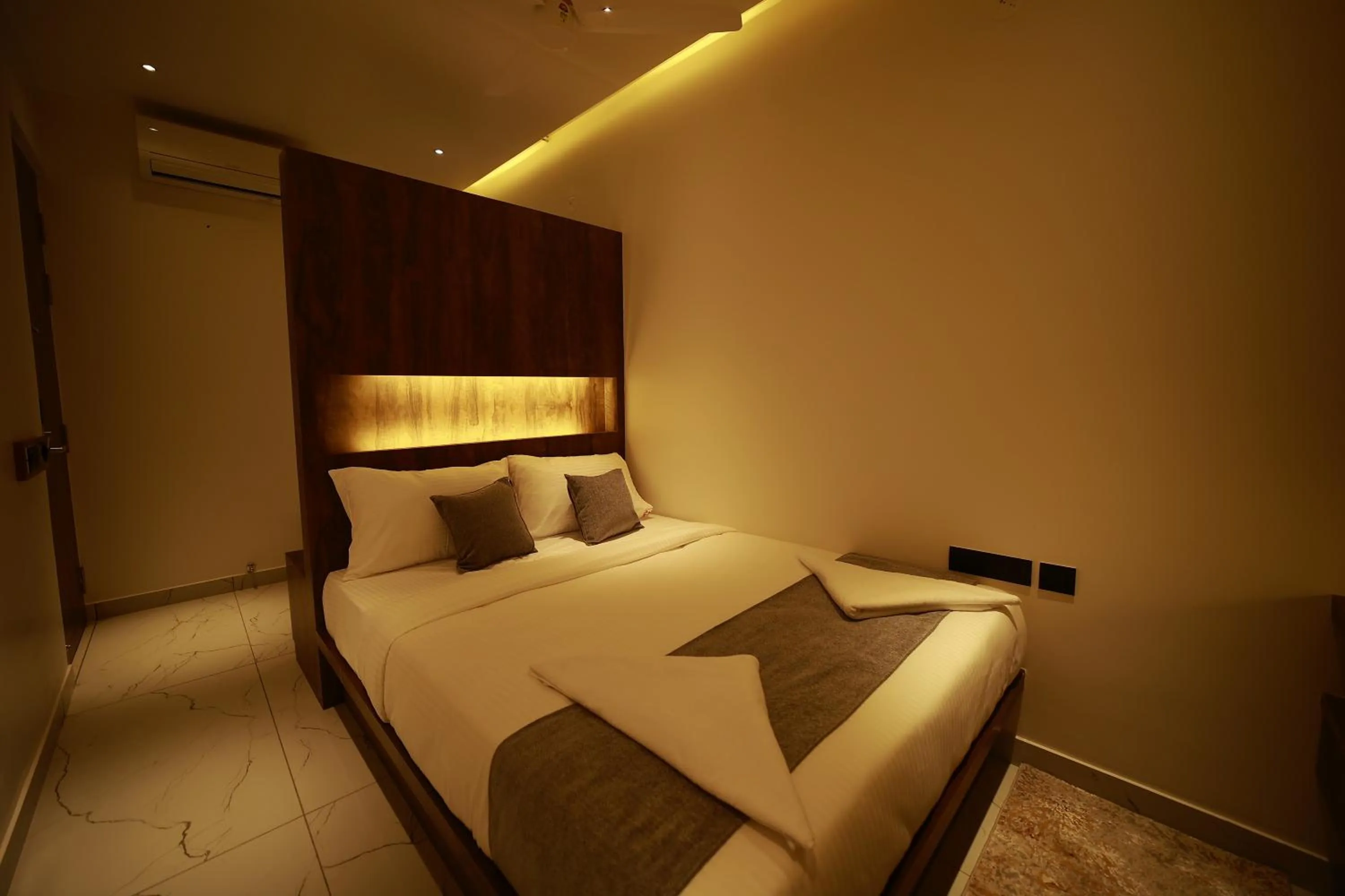 Living room, Bed in The Mysore Grand