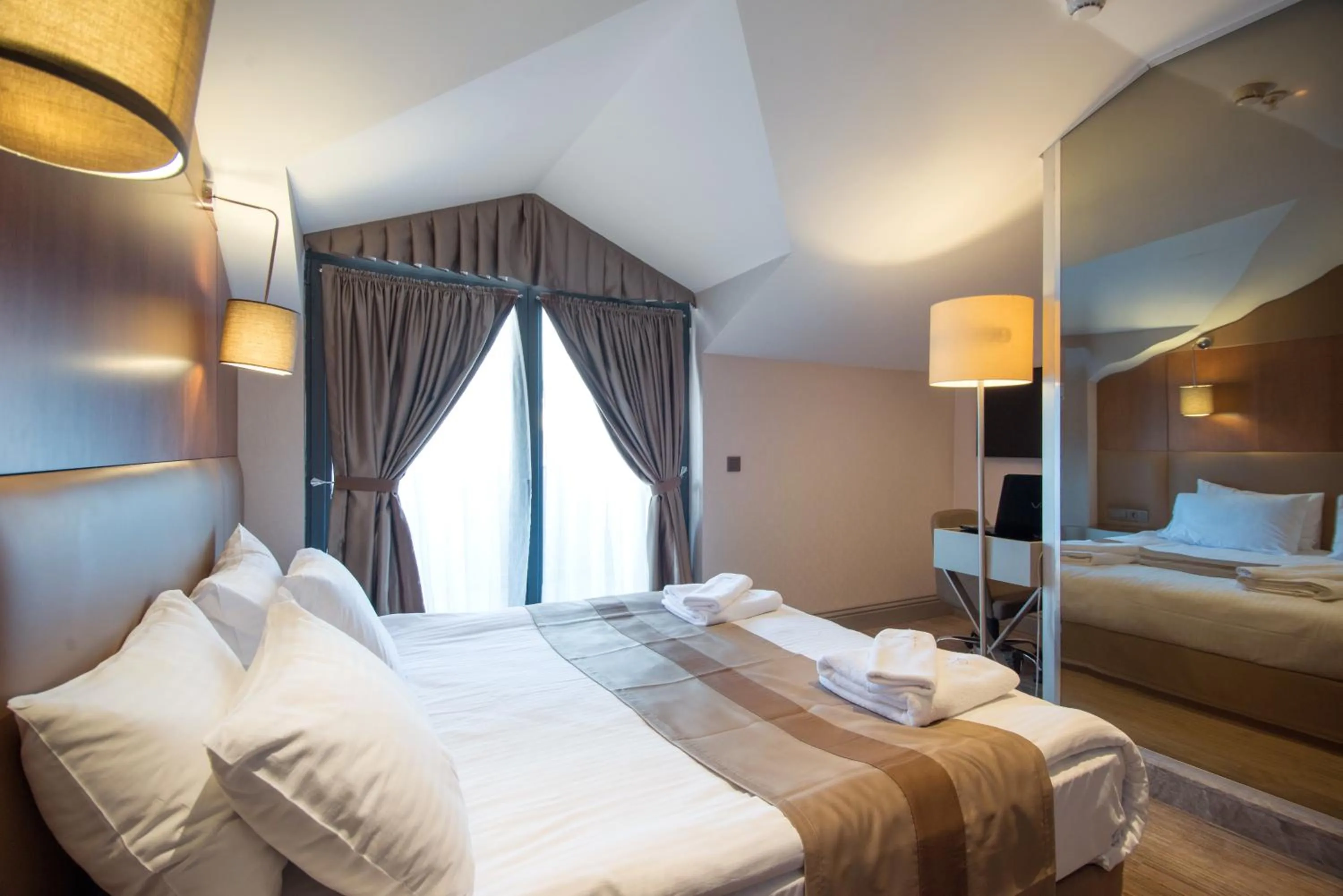 Photo of the whole room in GK Regency Suites Hotel