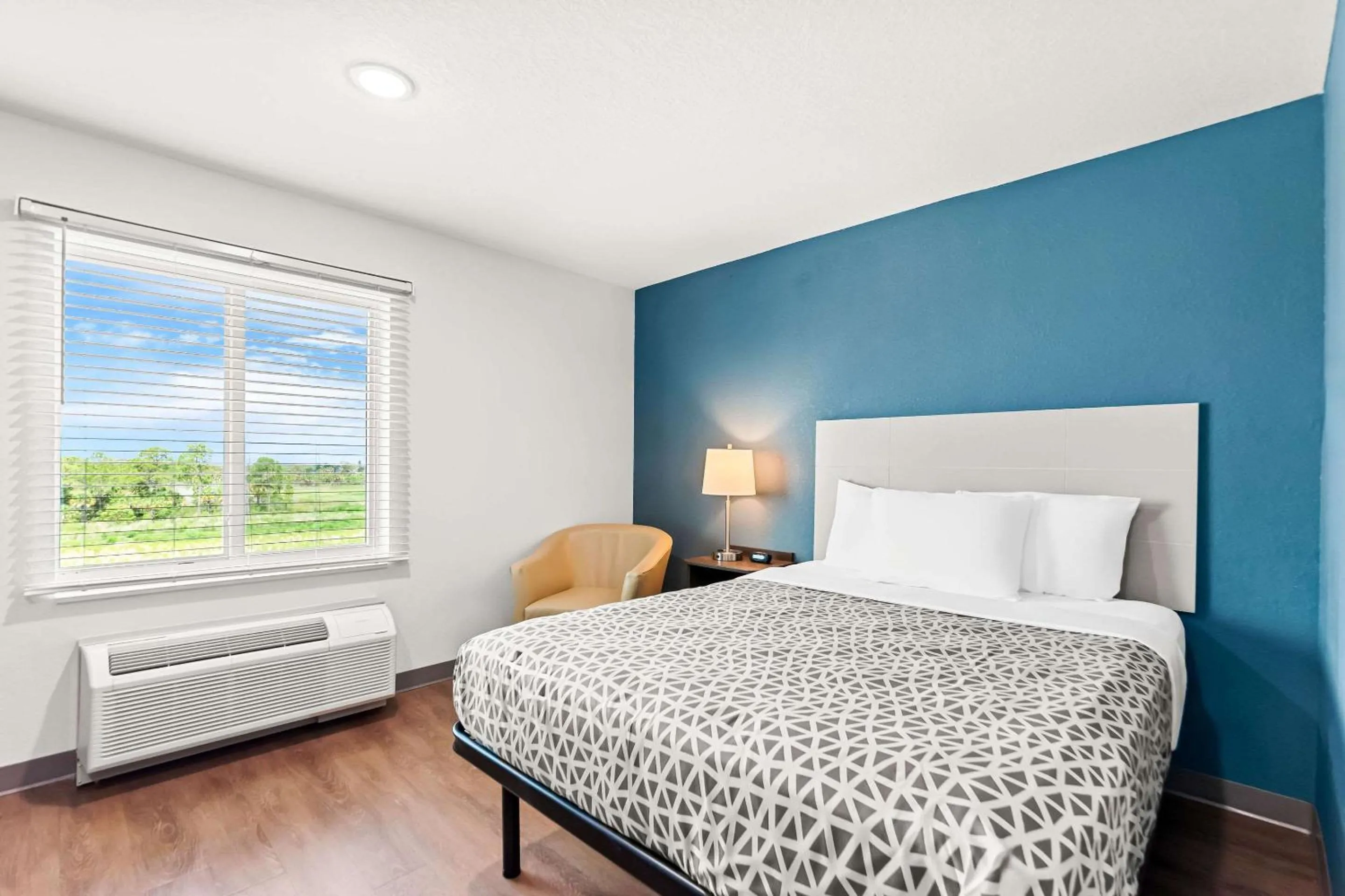 Bedroom, Bed in WoodSpring Suites Hudson Port Richey