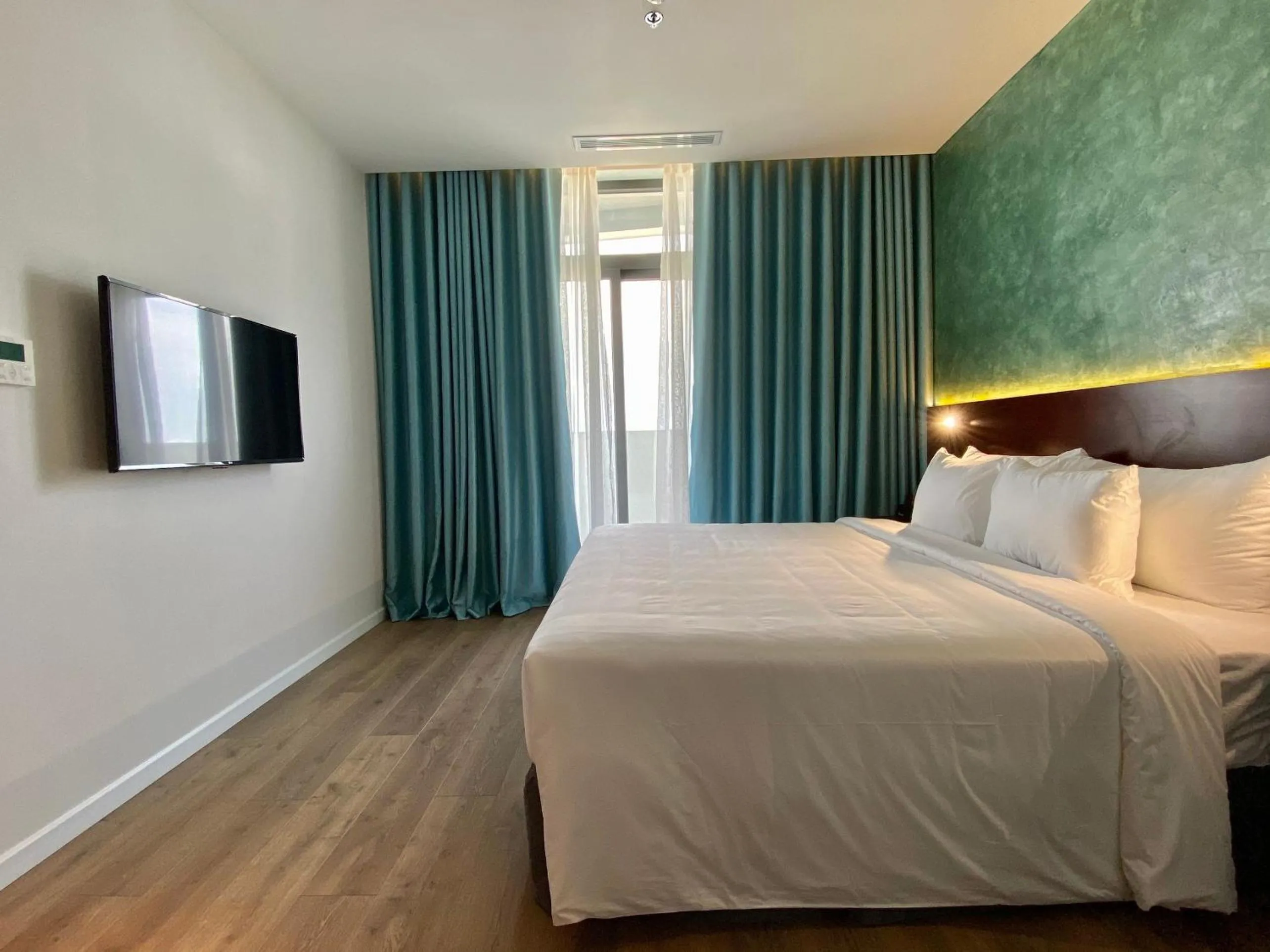 Bed in NEWCC HOTEL AND SERVICED APARTMENT