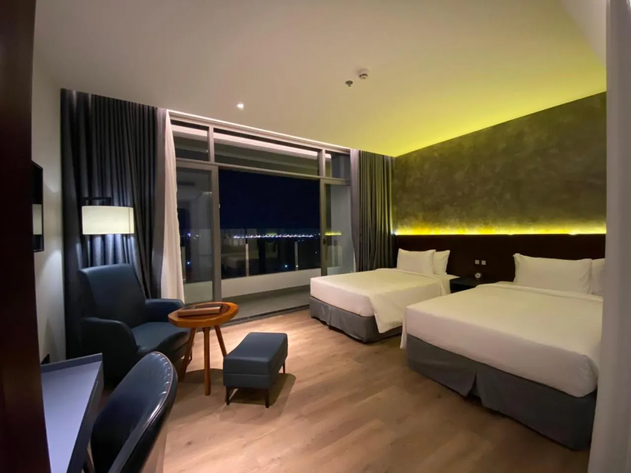 Bed in NEWCC HOTEL AND SERVICED APARTMENT