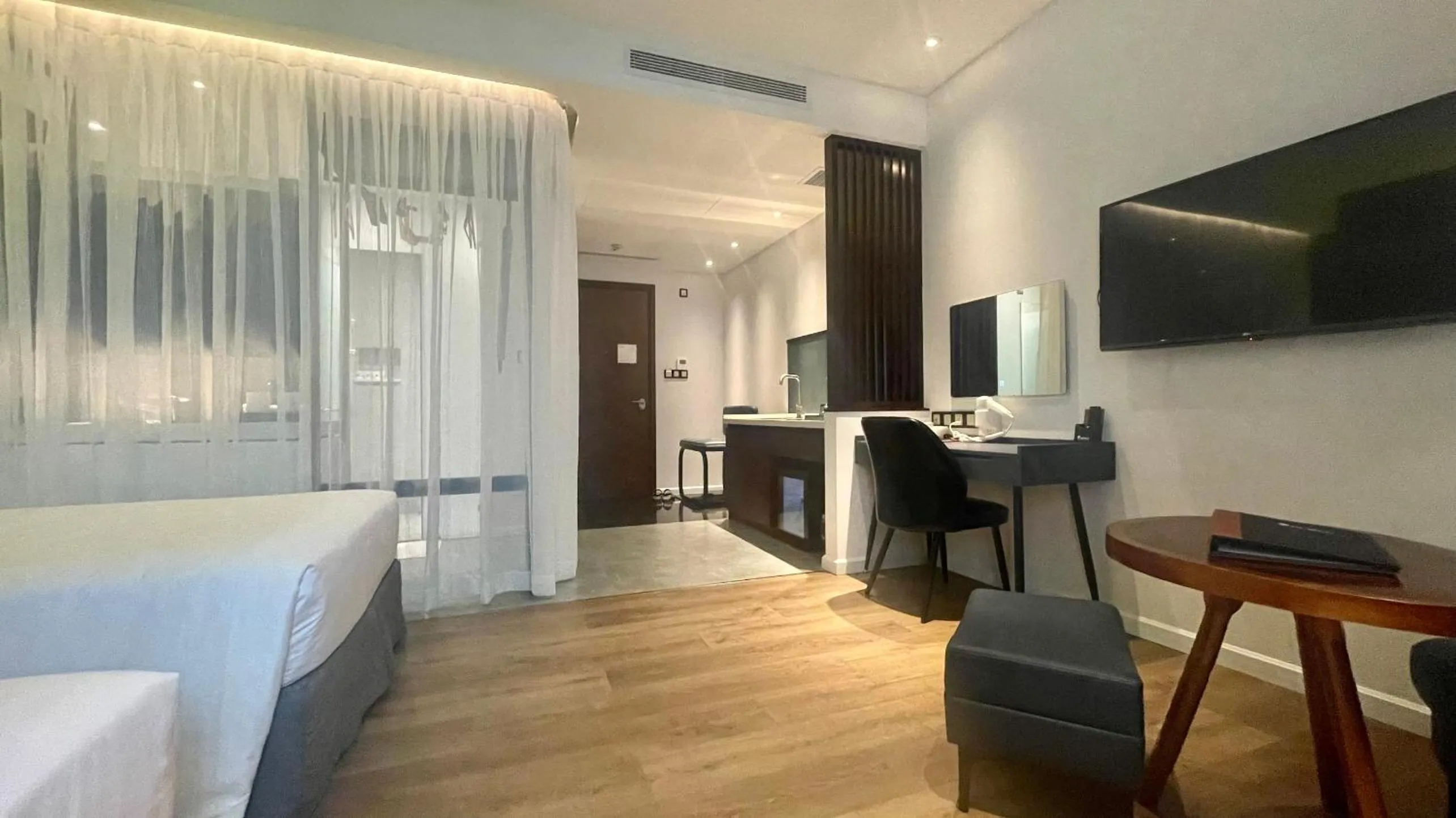 Bed in NEWCC HOTEL AND SERVICED APARTMENT