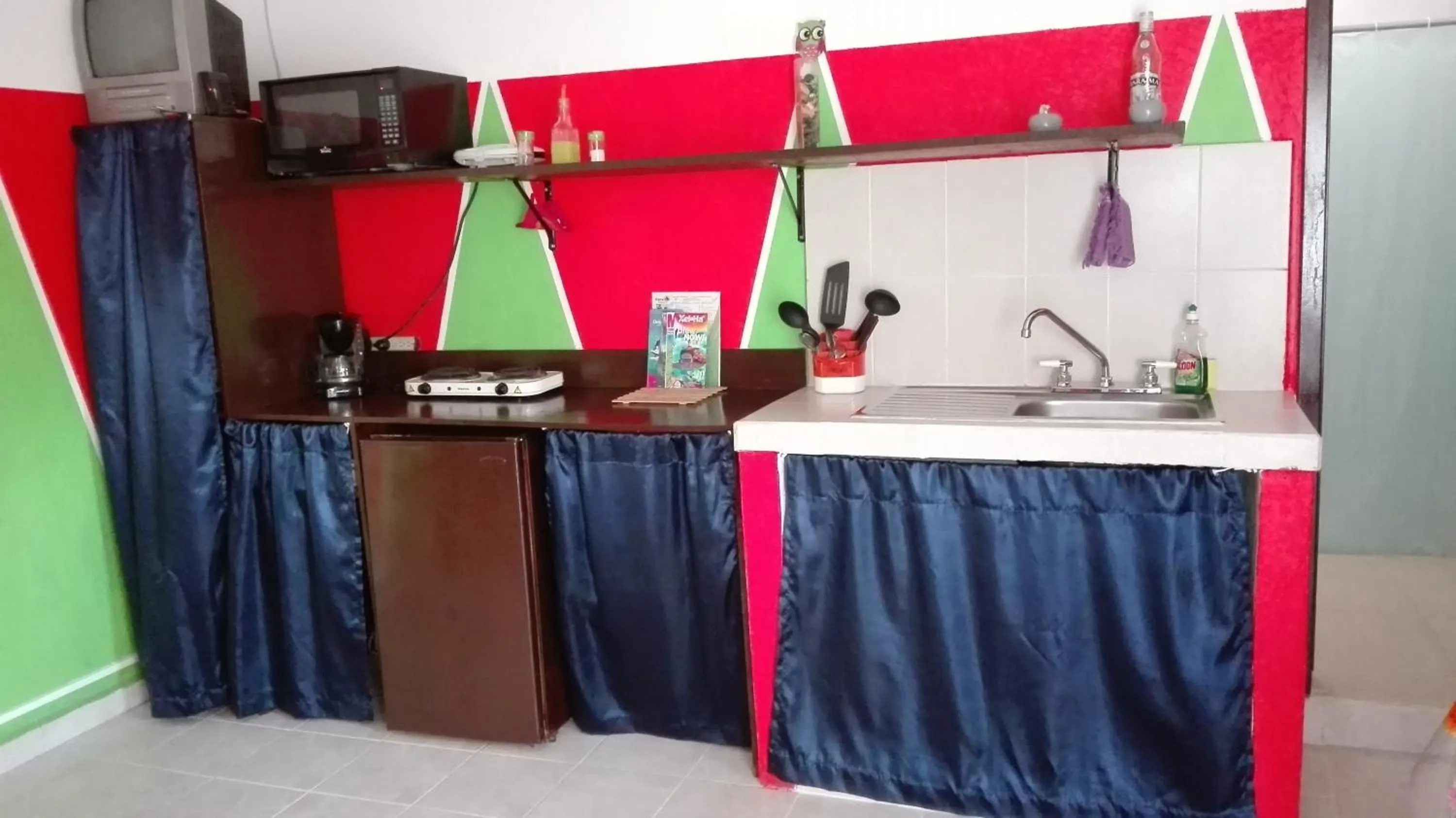 Kitchen or kitchenette in Appartamenti Melissa