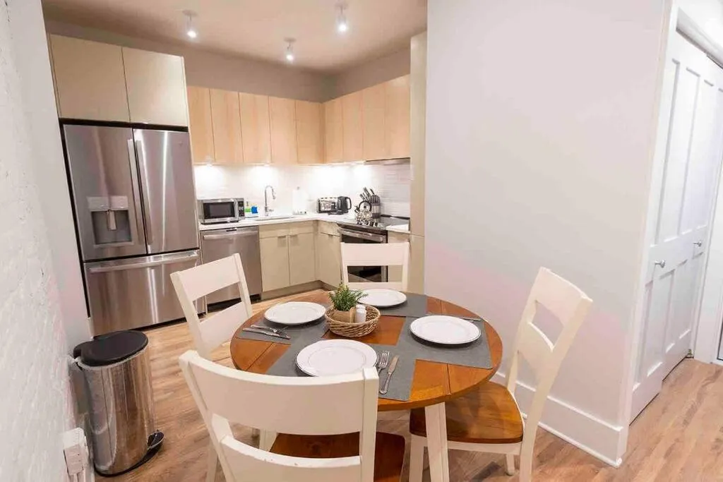 Kitchen or kitchenette in Spacious 1 bed 1 bath Downtown OTR condo minutes walk to the Reds Bengals stadium & more!