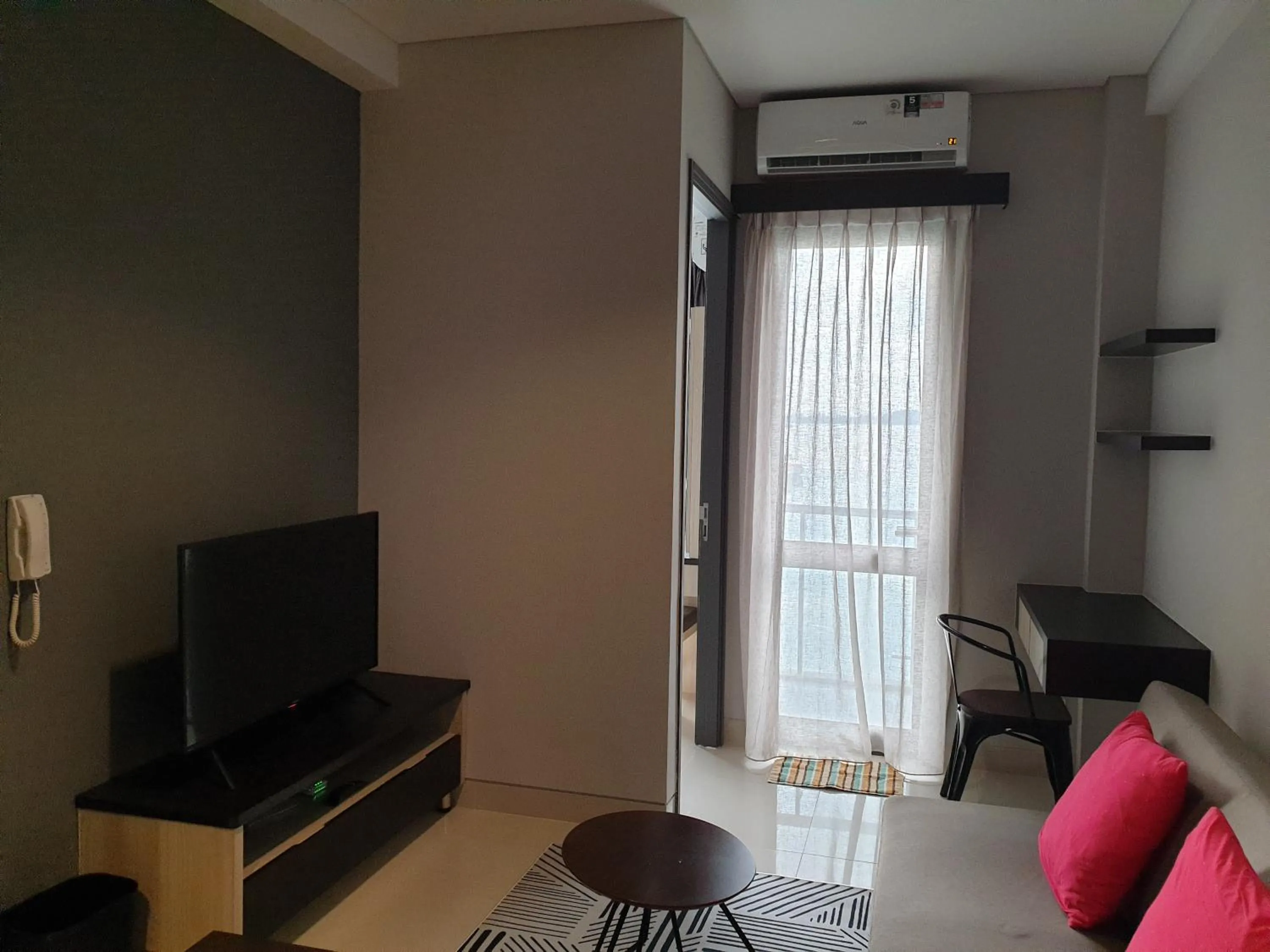 Living room in CozyHomes at One Residence Batam