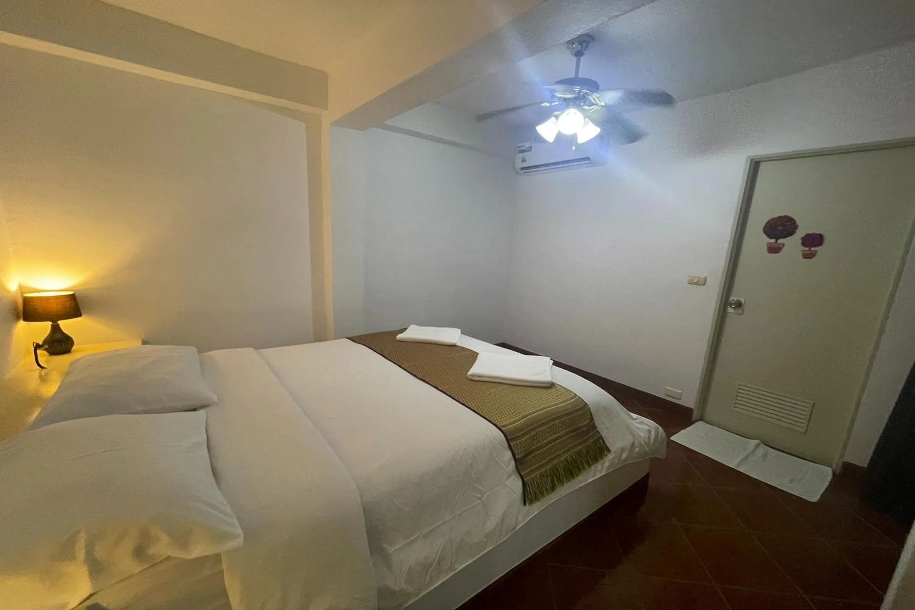 Bedroom, Bed in Swiss Villas Panoramic - SHA Certified