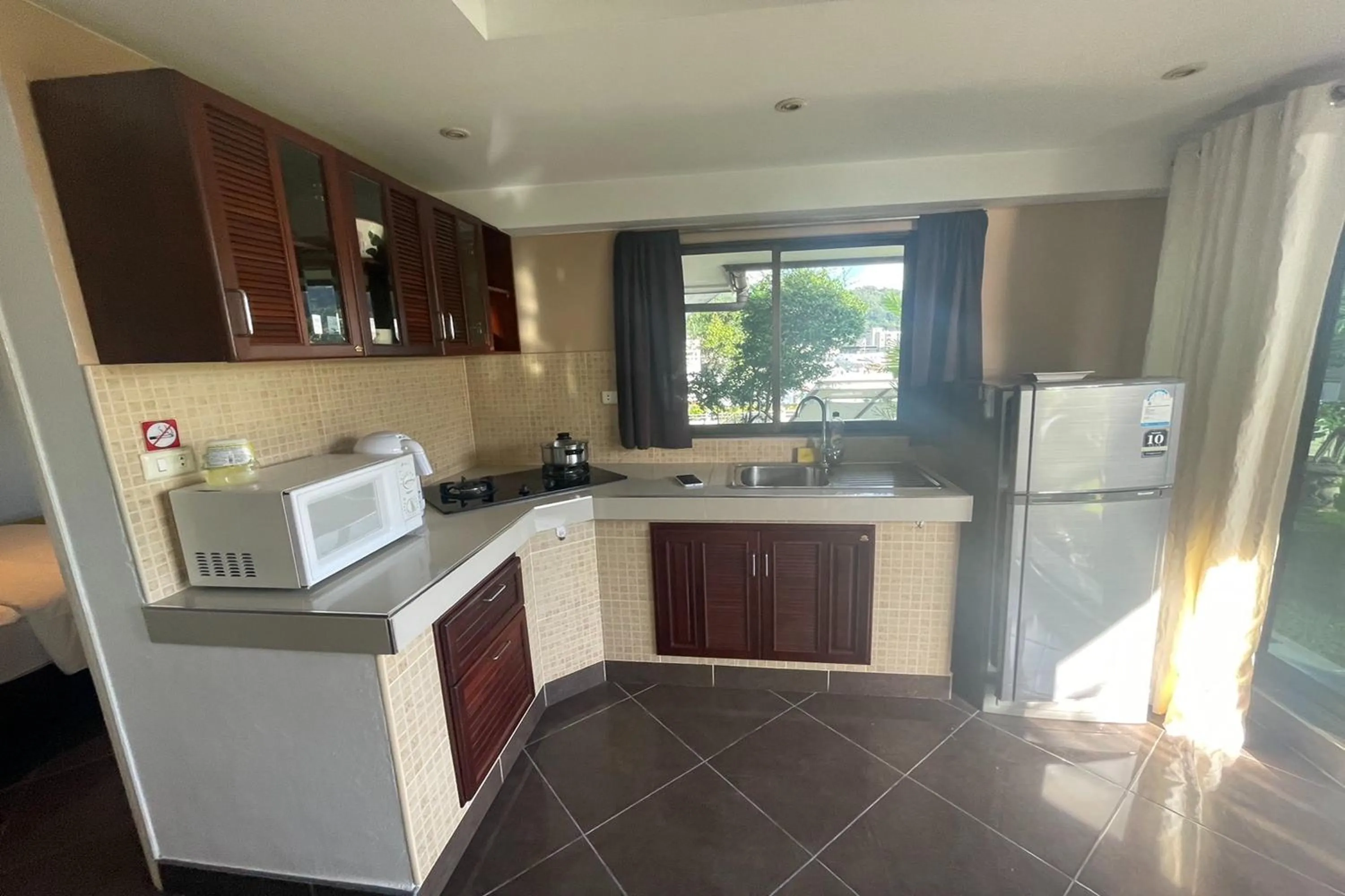 Kitchen or kitchenette in Swiss Villas Panoramic - SHA Certified