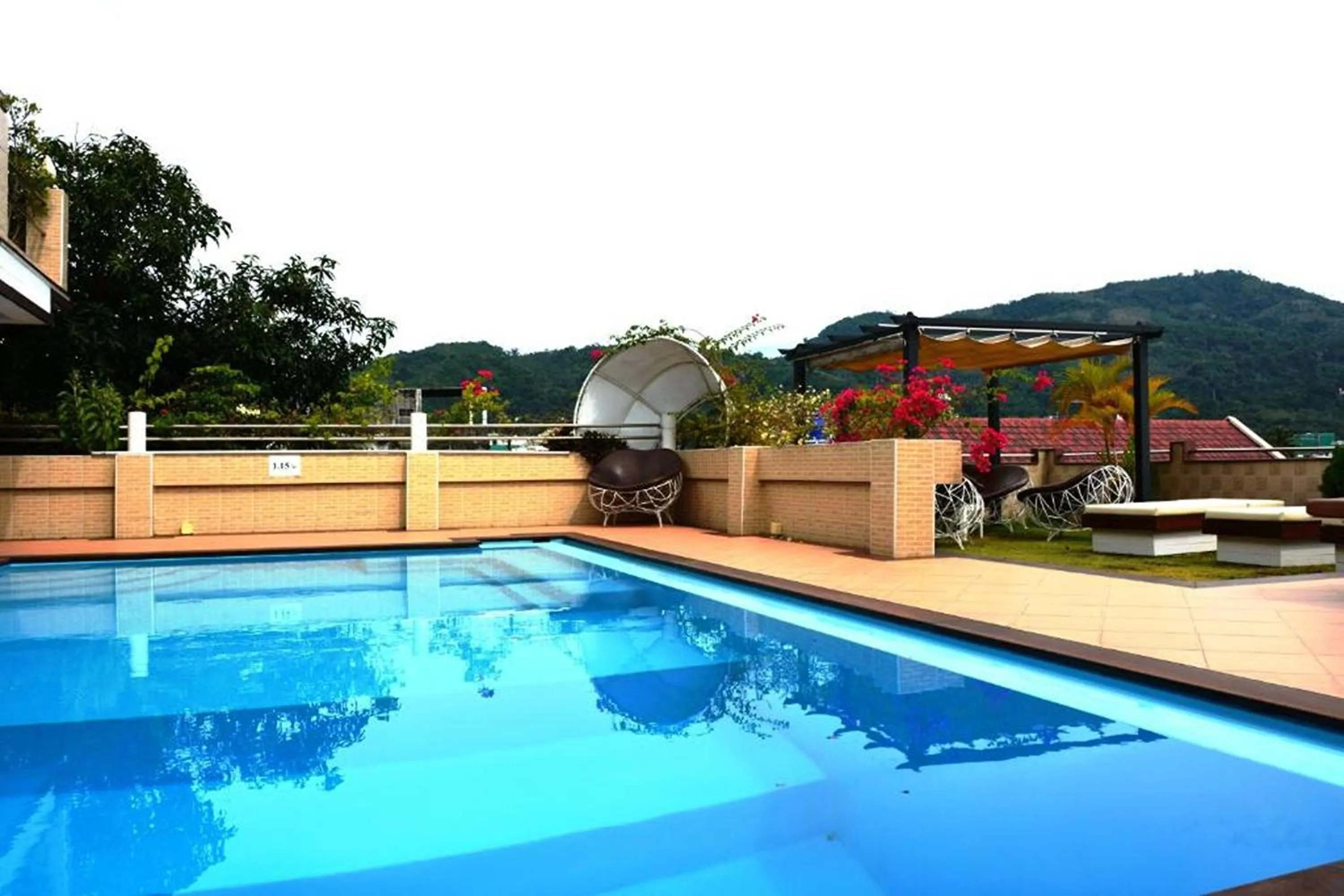 Swimming pool in Swiss Villas Panoramic - SHA Certified