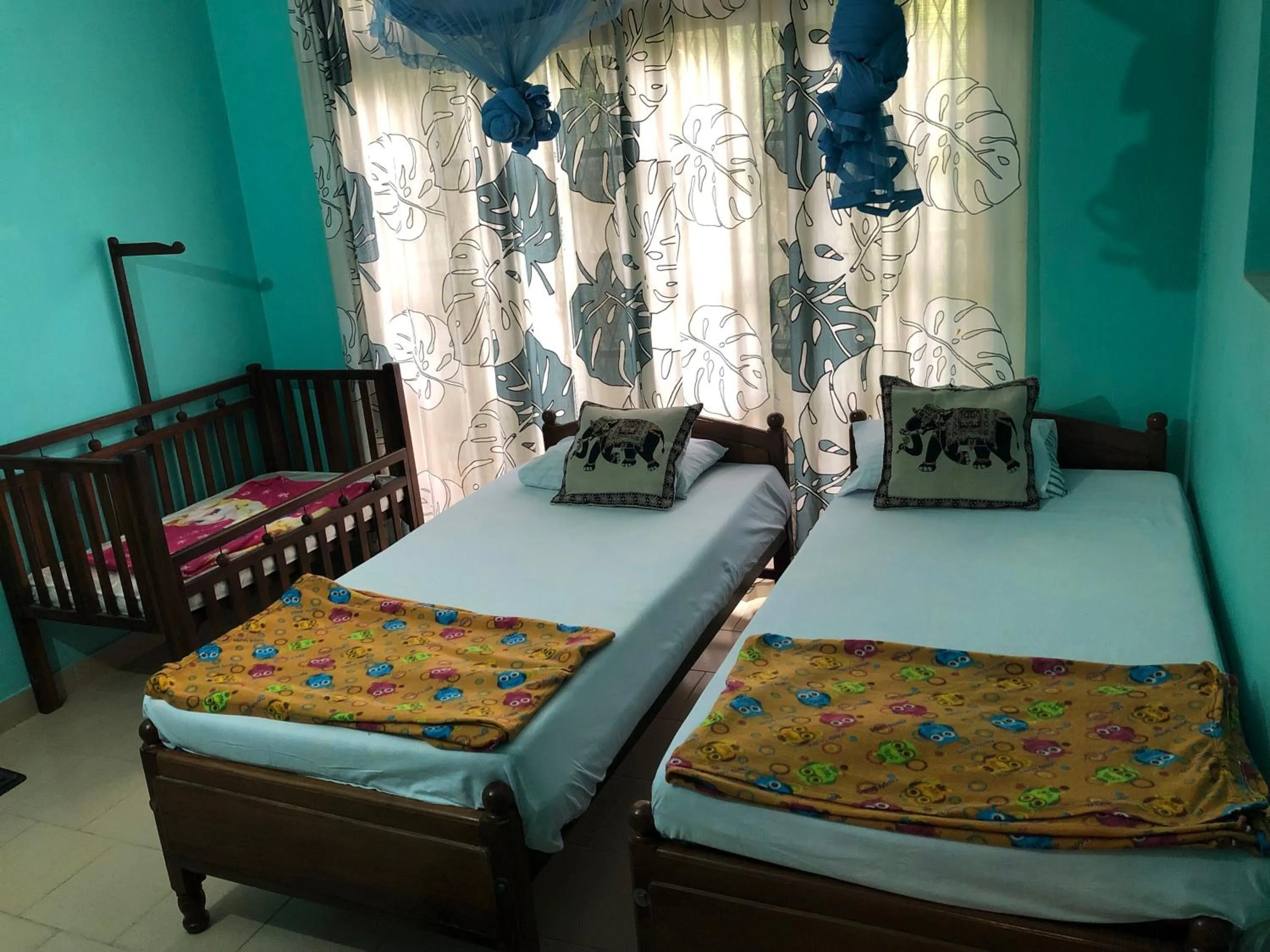 Bed in Araliya Holiday Bungalow