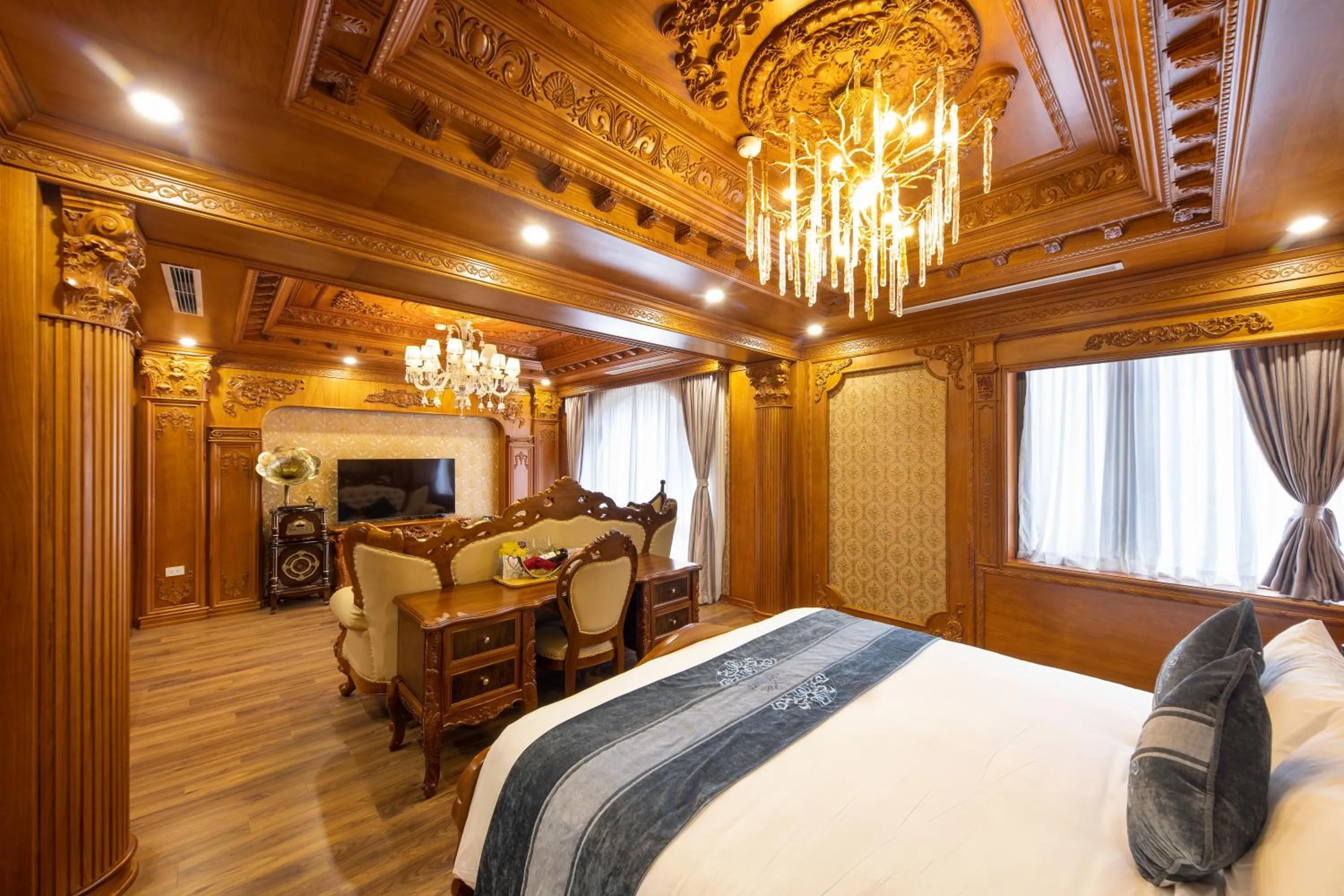 Communal lounge/ TV room, Bed in Glenda Tower Moc Chau Hotel