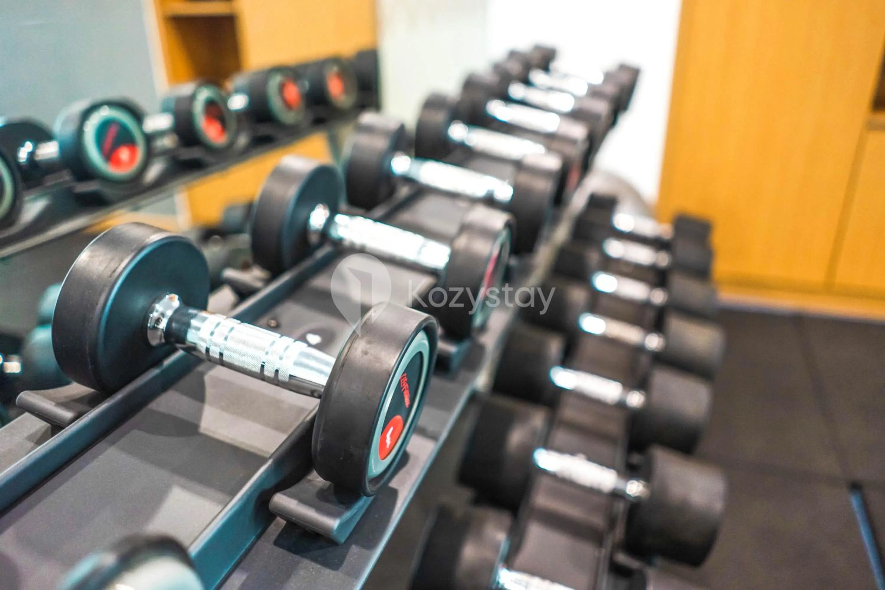 Fitness centre/facilities in Orchid by Kozystay - Kebon Jeruk