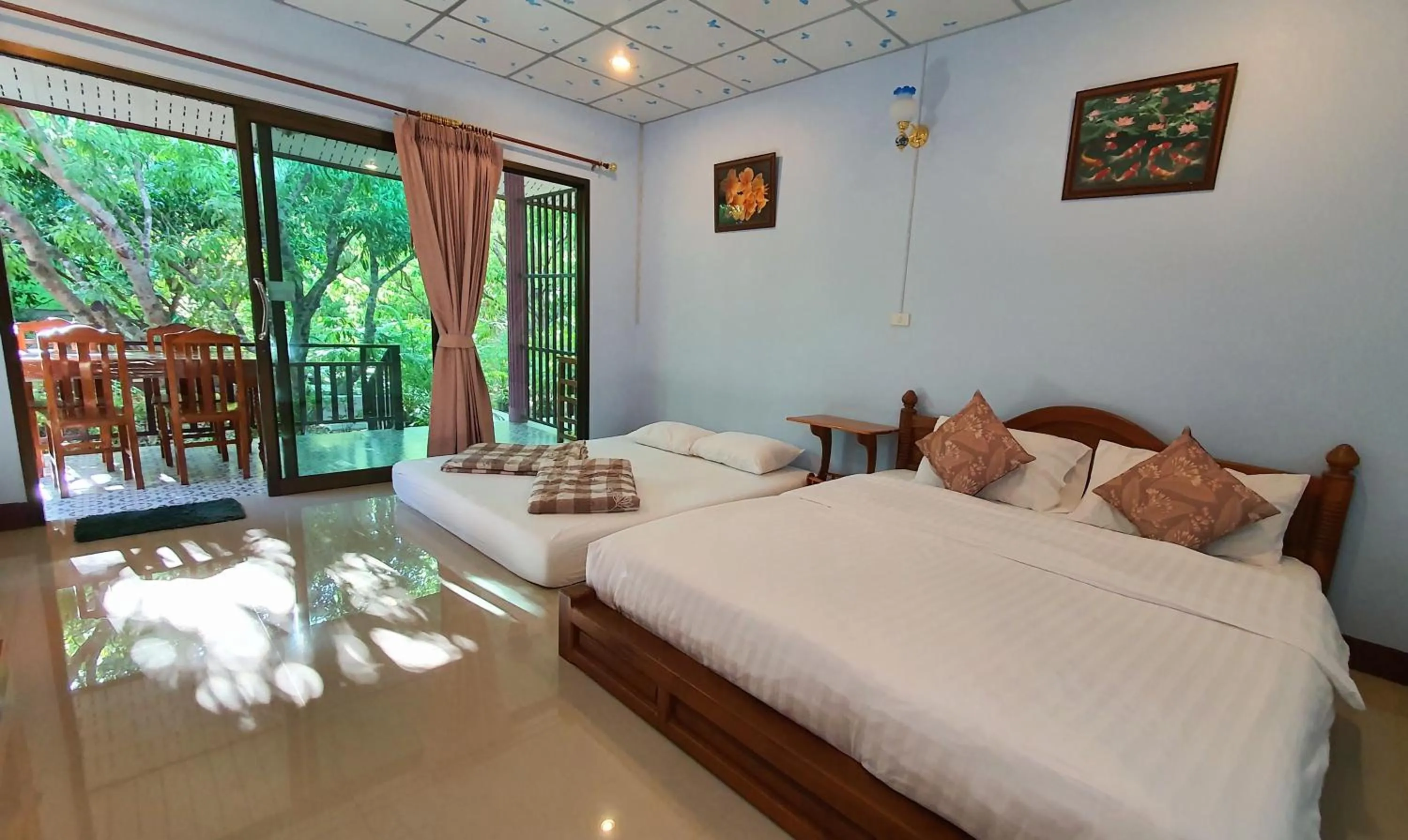 Bed in Warakorn Baansuan Amphawa